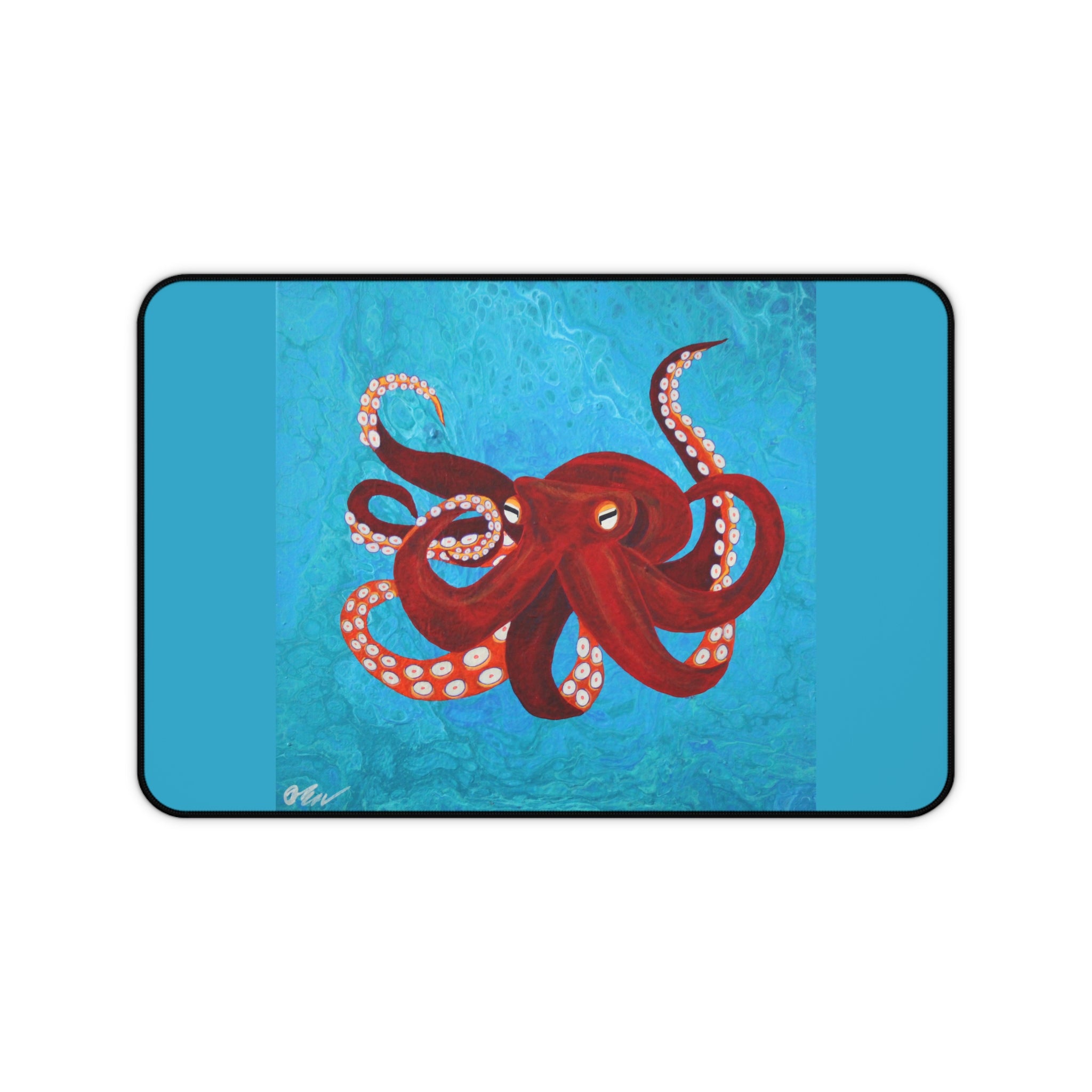 Desk pad with red octopus design on a blue background