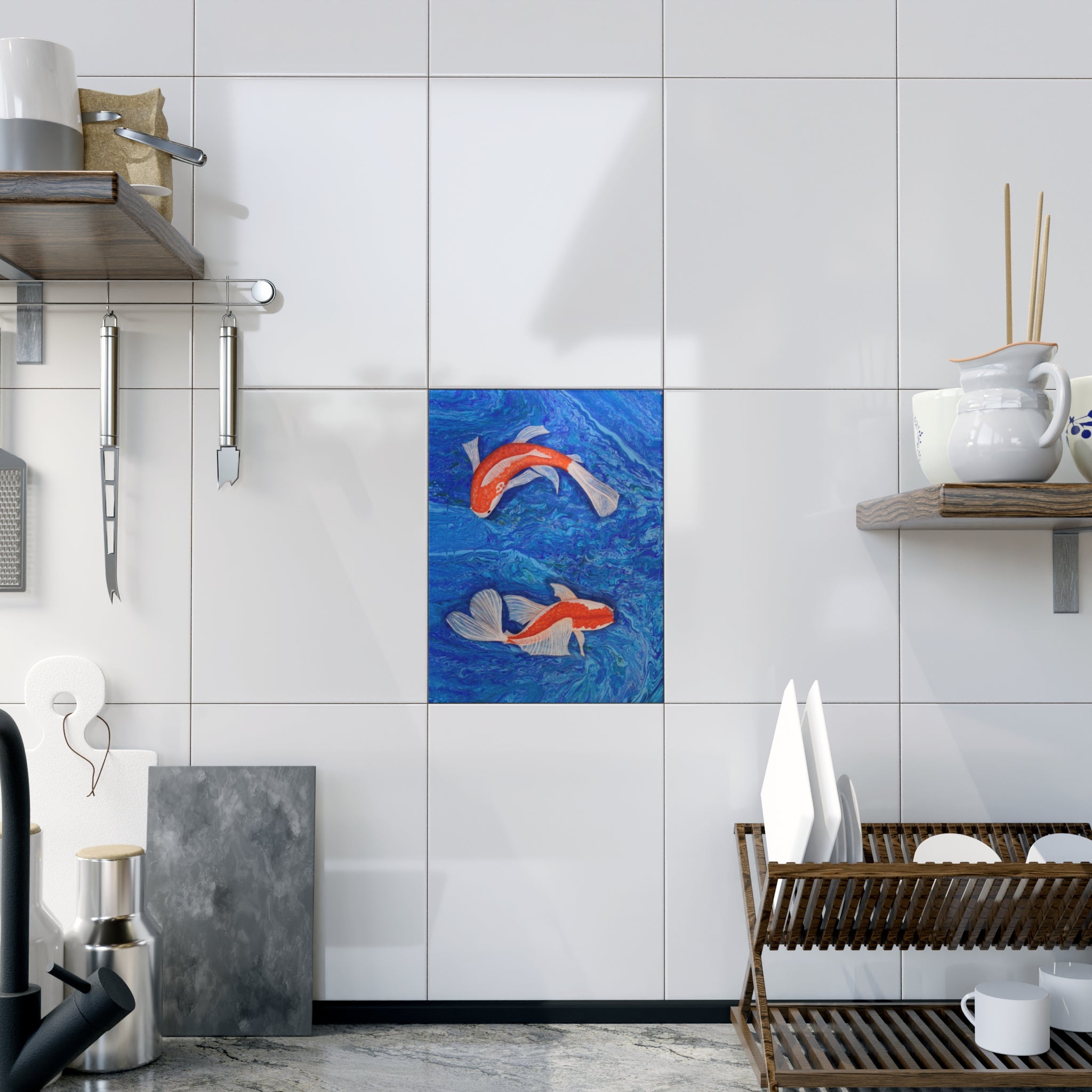Kitchen interior with tiled wall featuring a fish artwork on tile