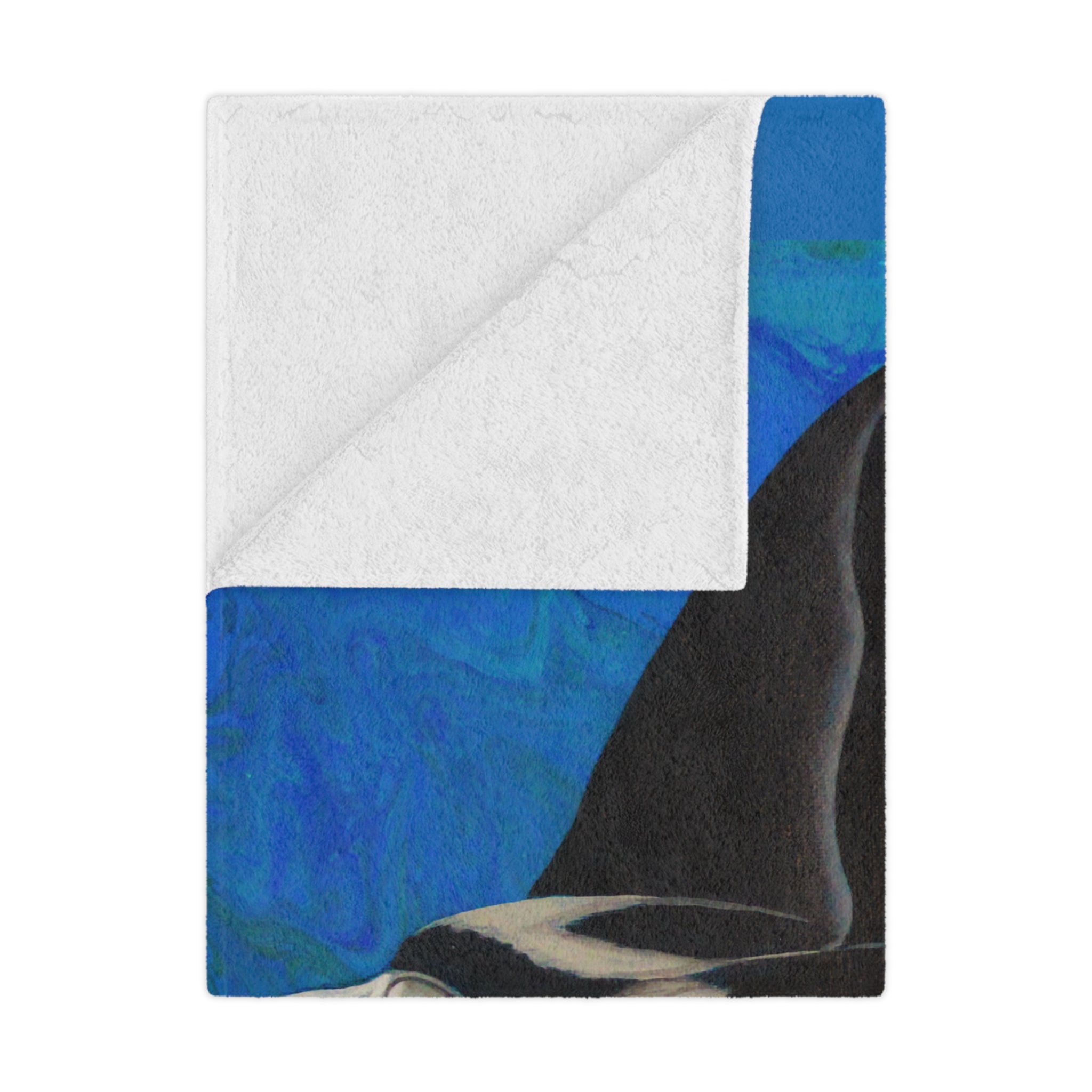 Folded blanket with blue and white pattern on a white background