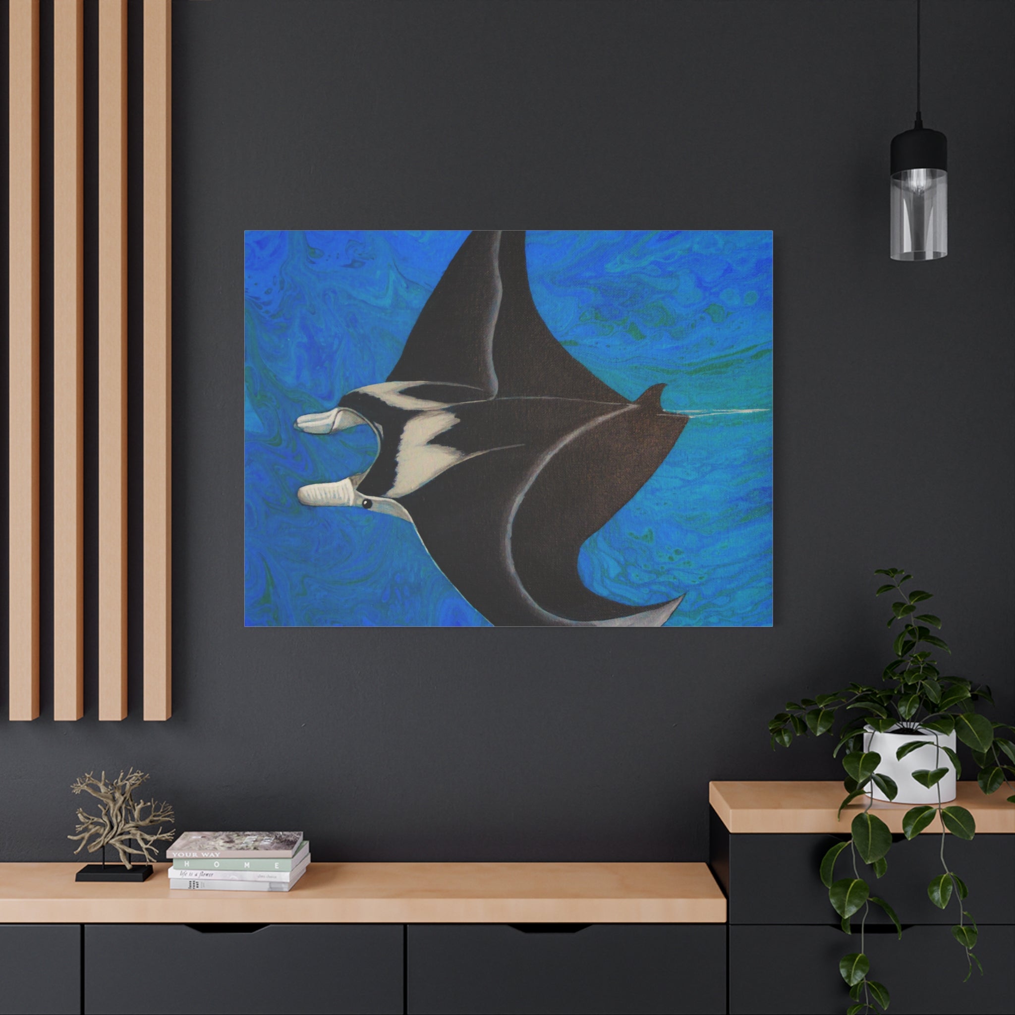 Artistic depiction of a manta ray on a blue background in a modern interior setting.