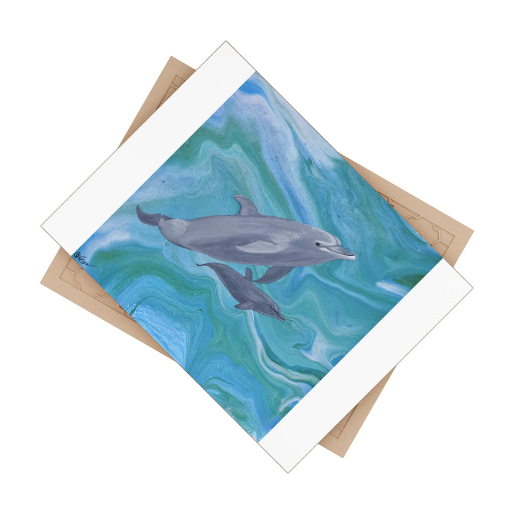 Tile with dolphins on a blue and green abstract background and beige backing