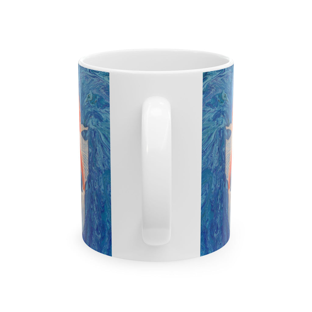 White mug with blue marbled design on a white background