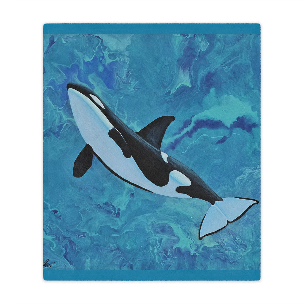 Orca whale blanket on a blue and green abstract background
