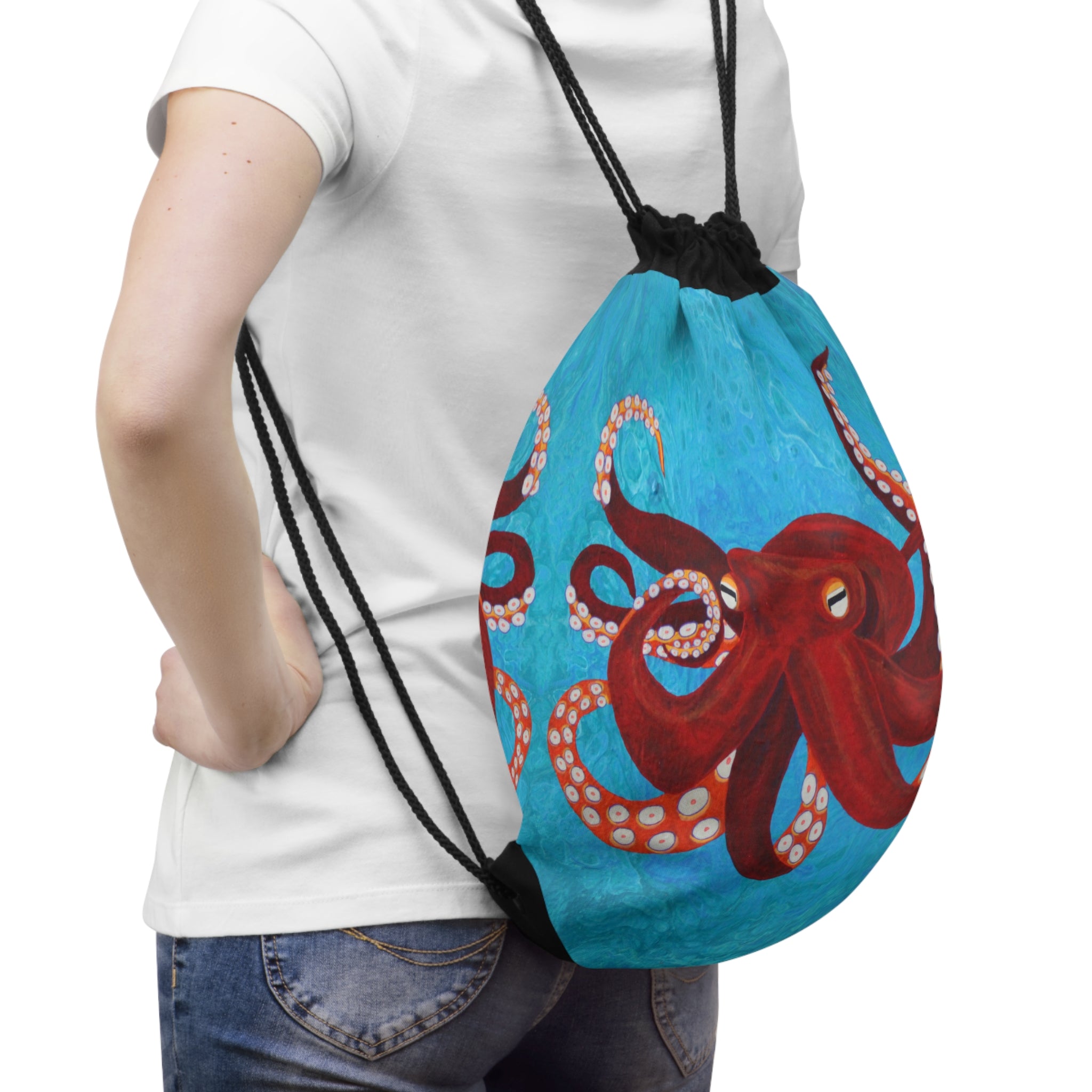 Person wearing a drawstring bag with an octopus design on a white background