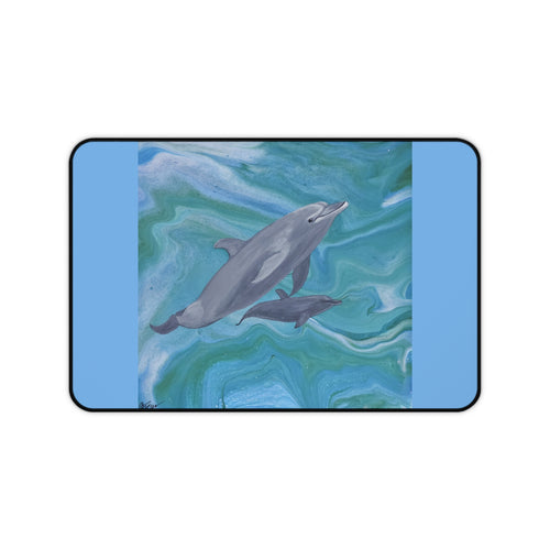 Desk mat with dolphins on a blue and green abstract background