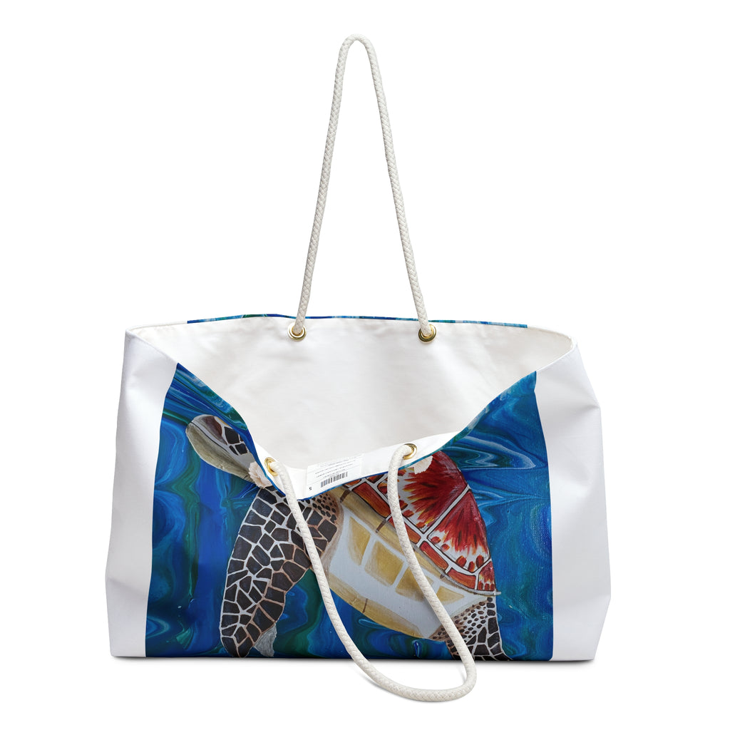 Tote bag with a turtle and boat design on a white background