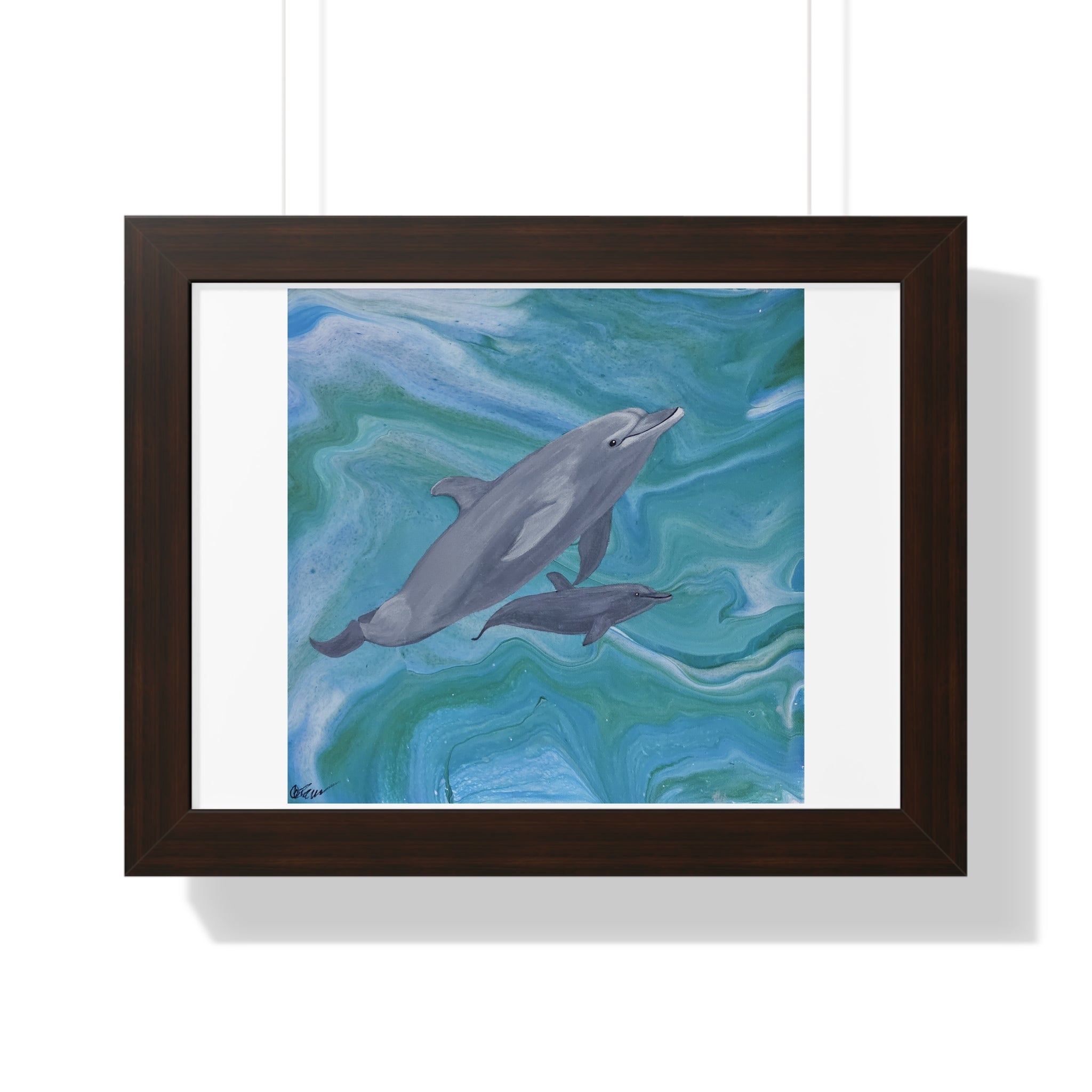 Framed artwork of two dolphins swimming against a blue and green wave background.