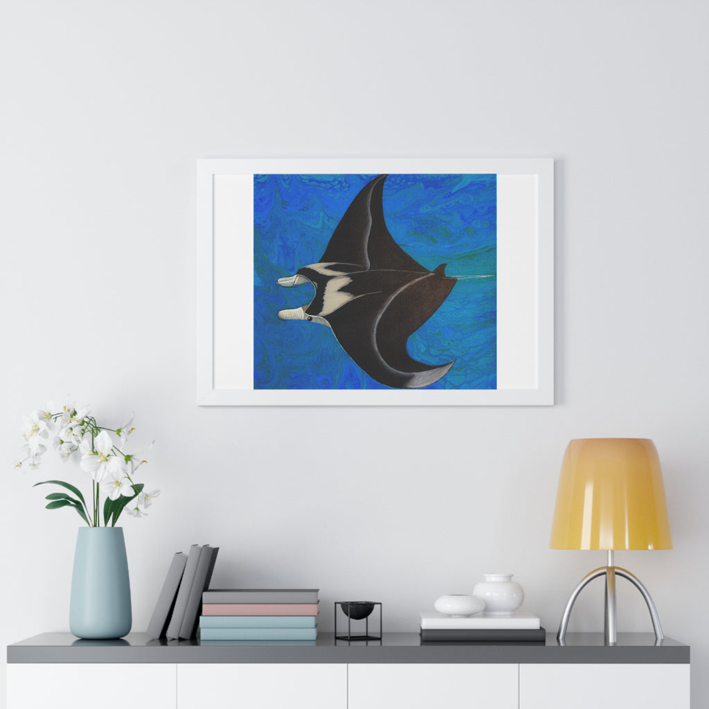 Framed artwork of a manta ray on a wall above a shelf with decor items.
