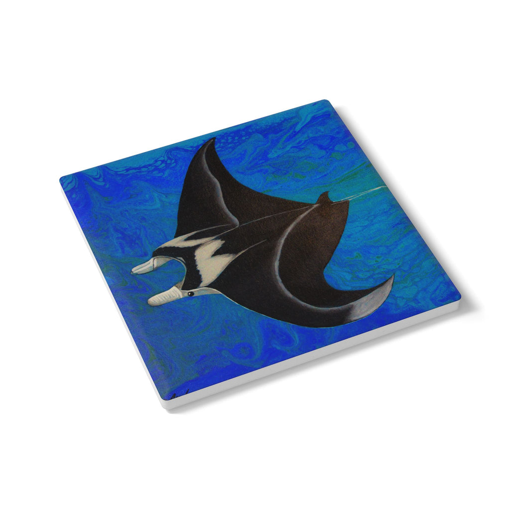 Square ceramic coaster with a manta ray design on a blue background