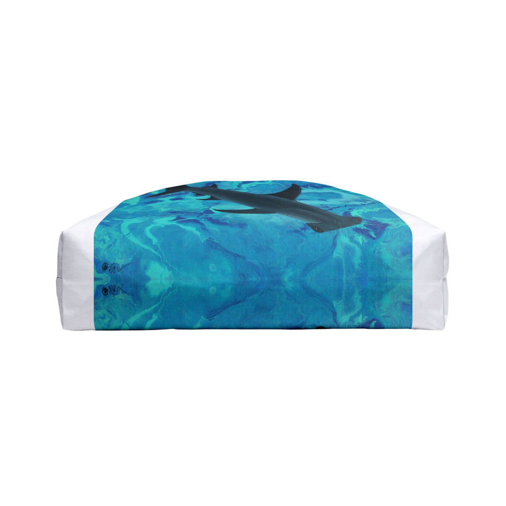Bottom of bag with blue abstract design and white border on a white background