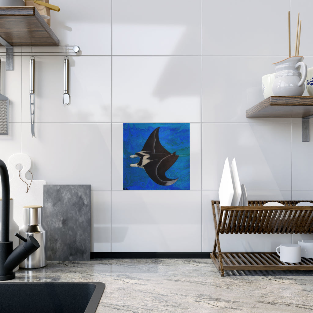 Kitchen interior with a blue abstract painting of a manta ray on a white tiled wall.