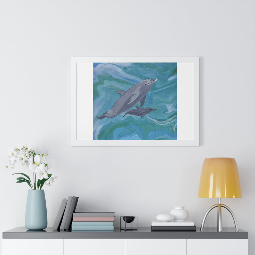 Framed artwork of dolphins on a wall above a shelf with decor items.