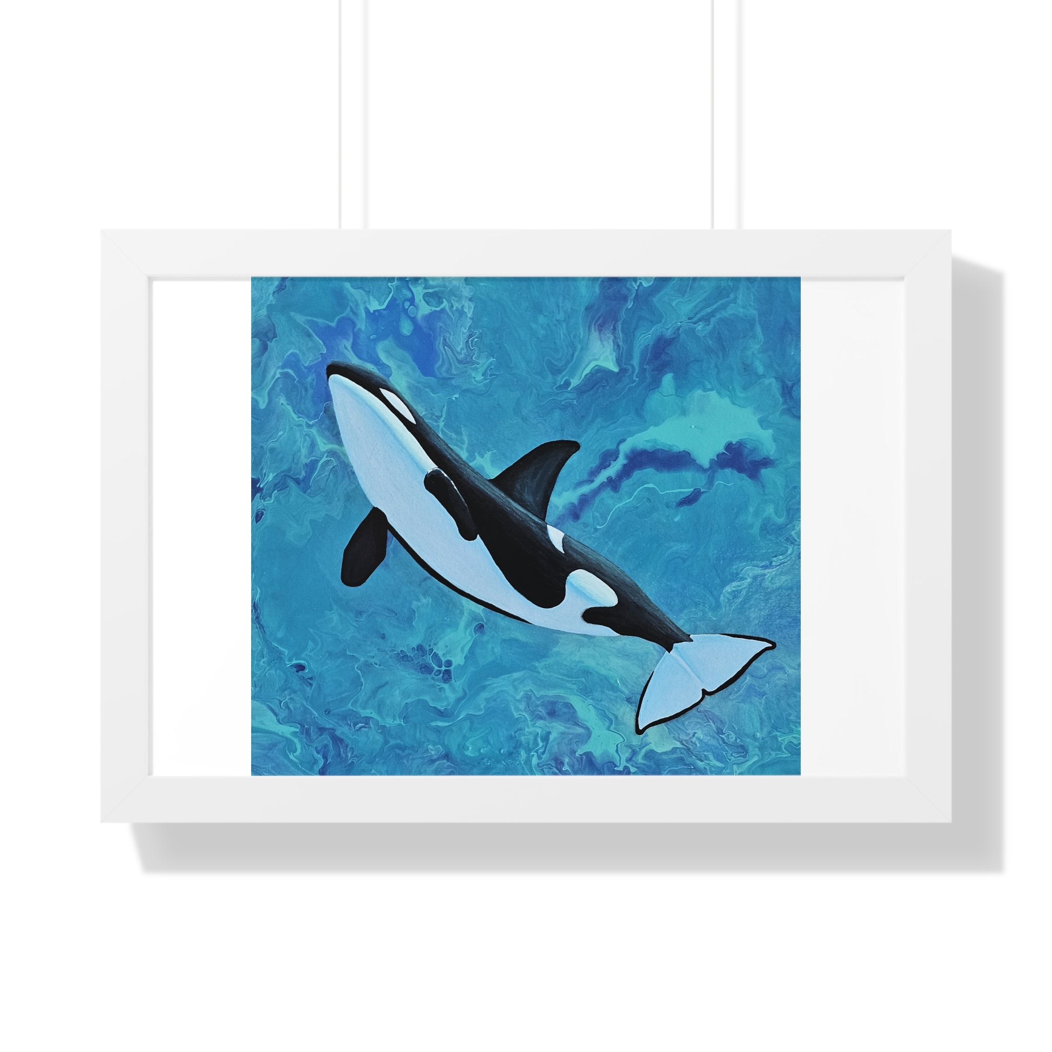 Framed artwork of an orca whale on a blue abstract background