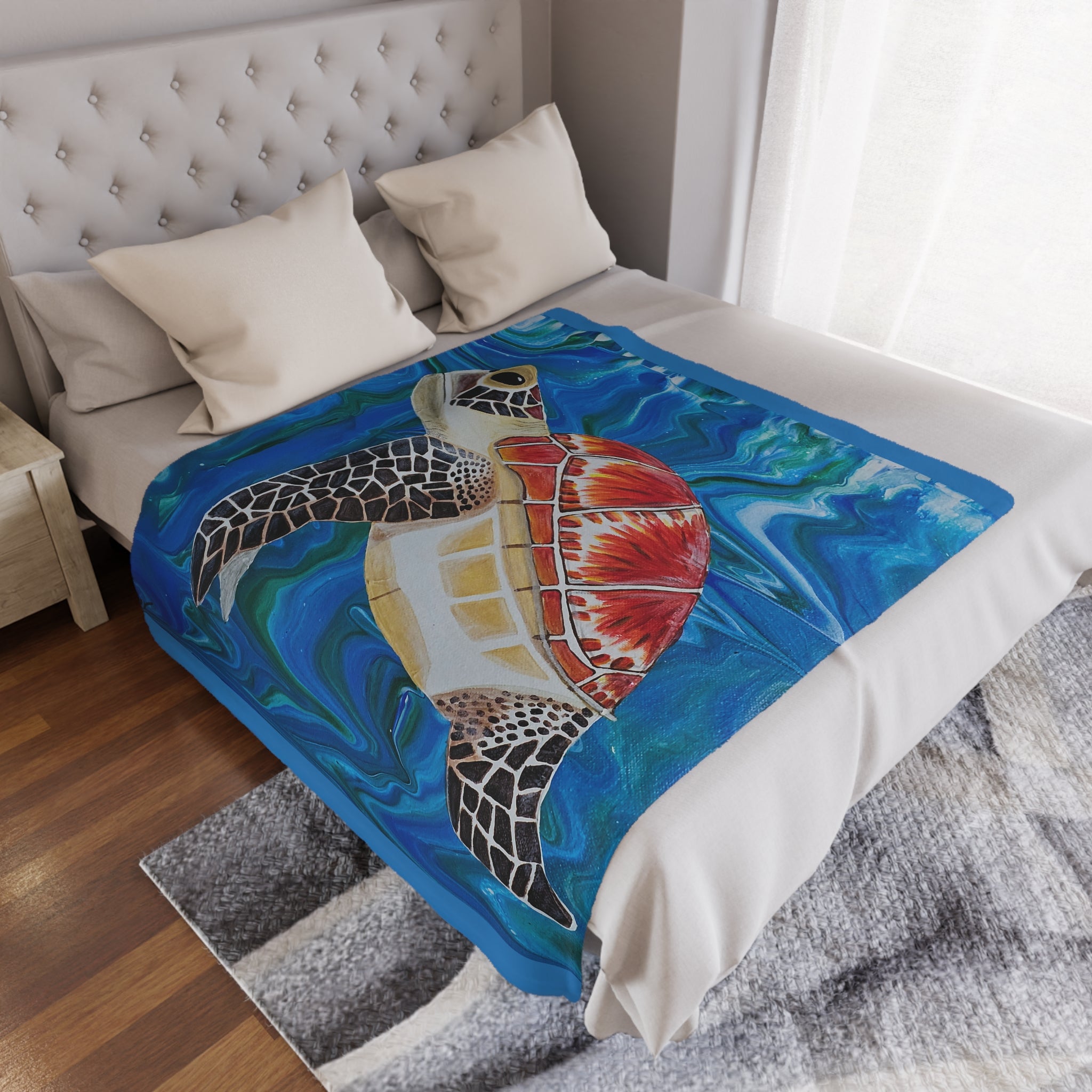 Colorful turtle design blanket on a bed in a bedroom setting