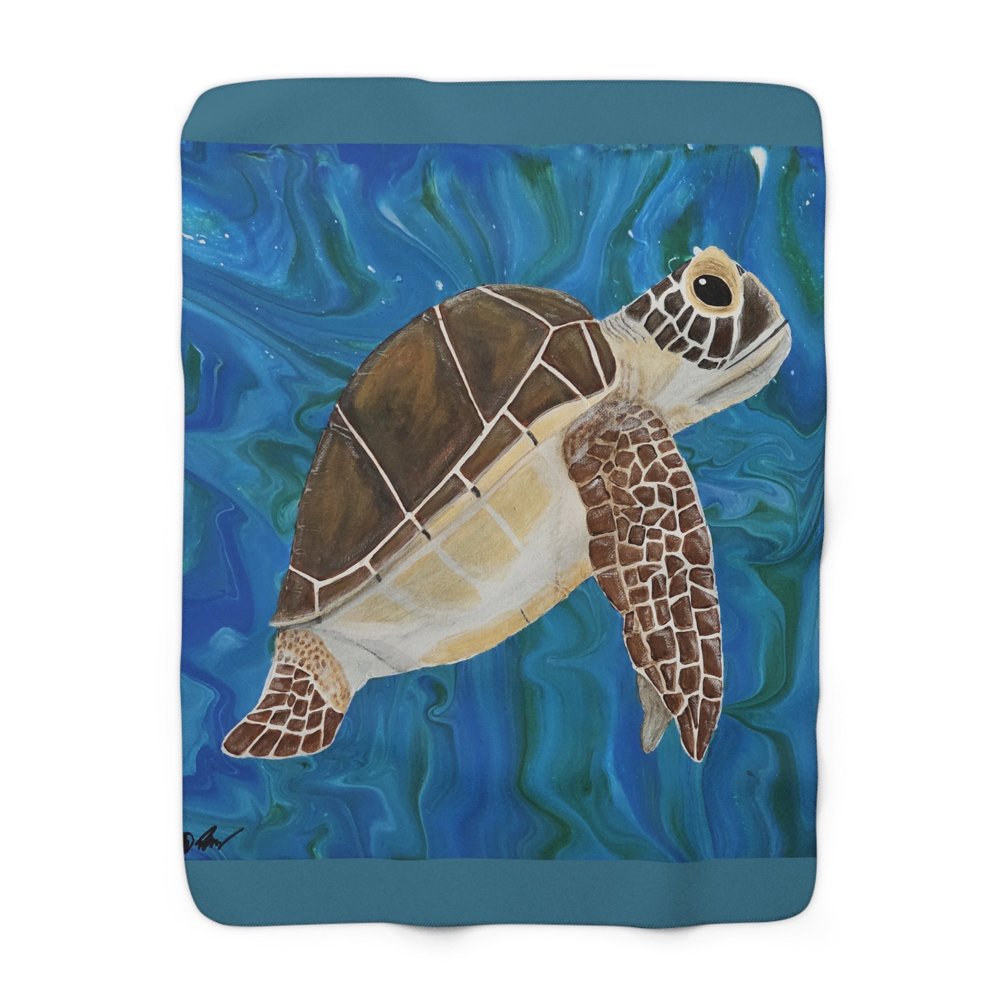 Fleece blanket with a turtle design on a blue background