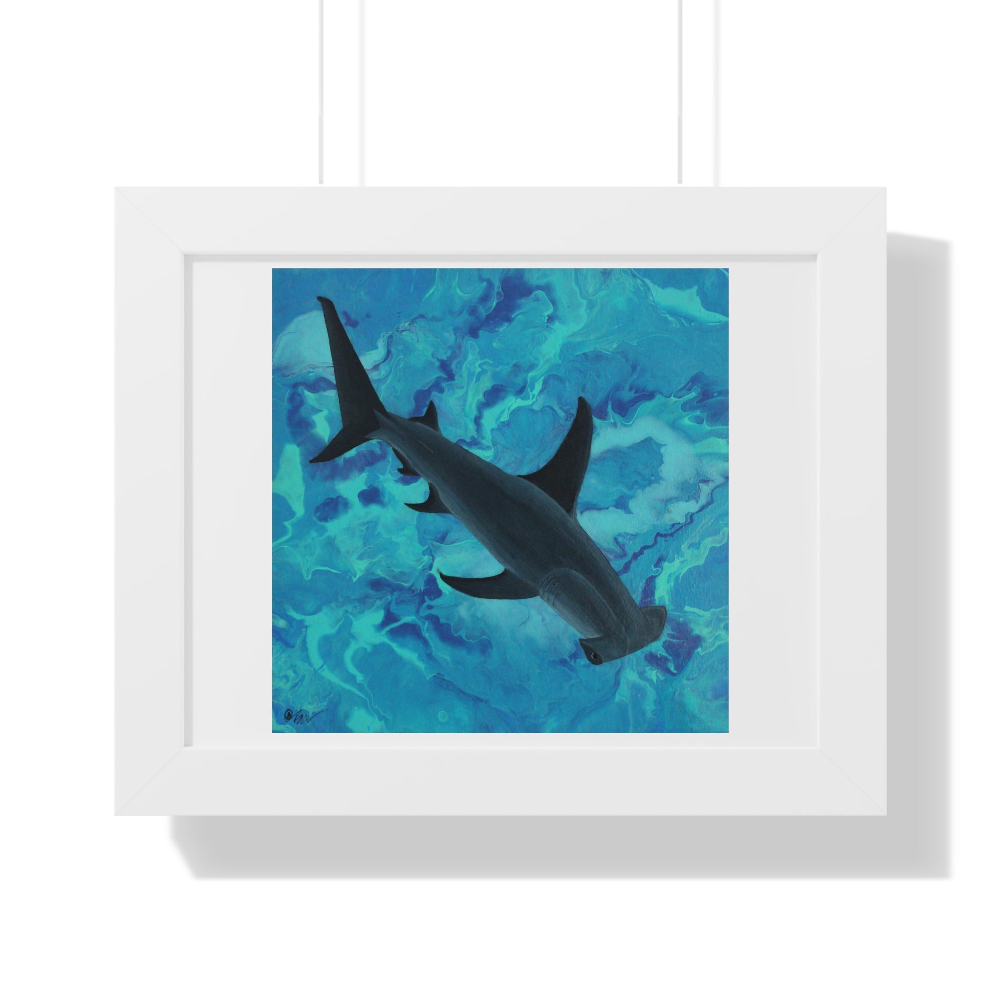 Framed artwork of a shark swimming underwater with a blue and green pattern.