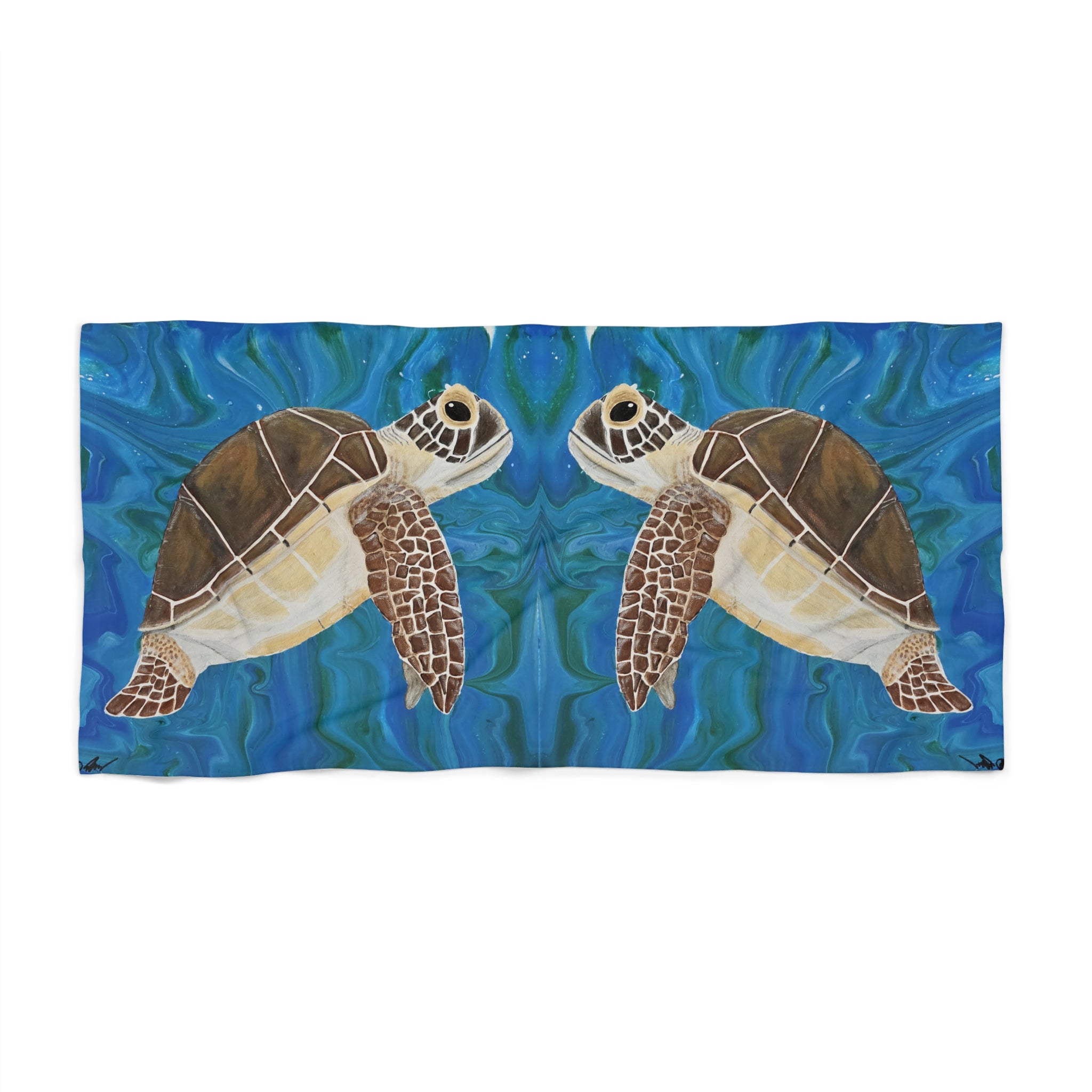 Towel/blanket with a design of two turtles on a blue water background