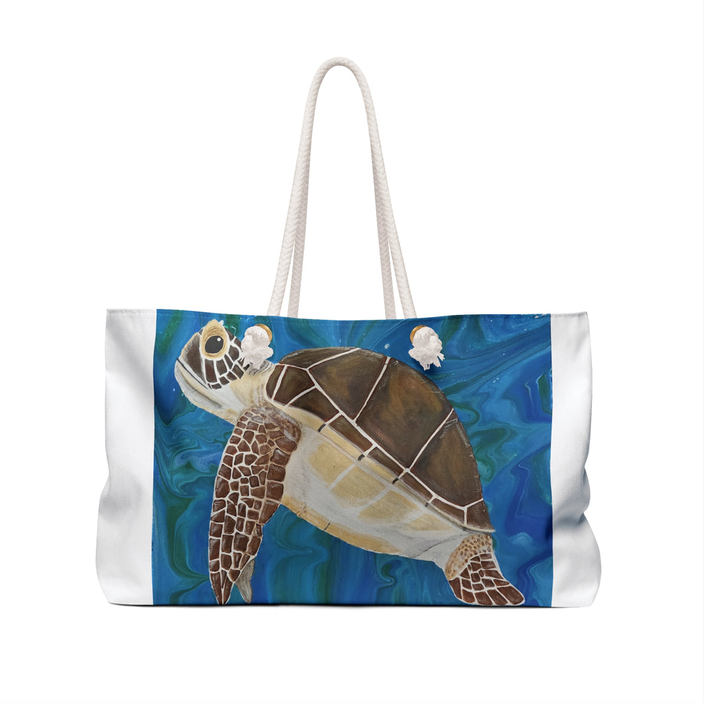 Tote bag with a turtle design on a blue and green background