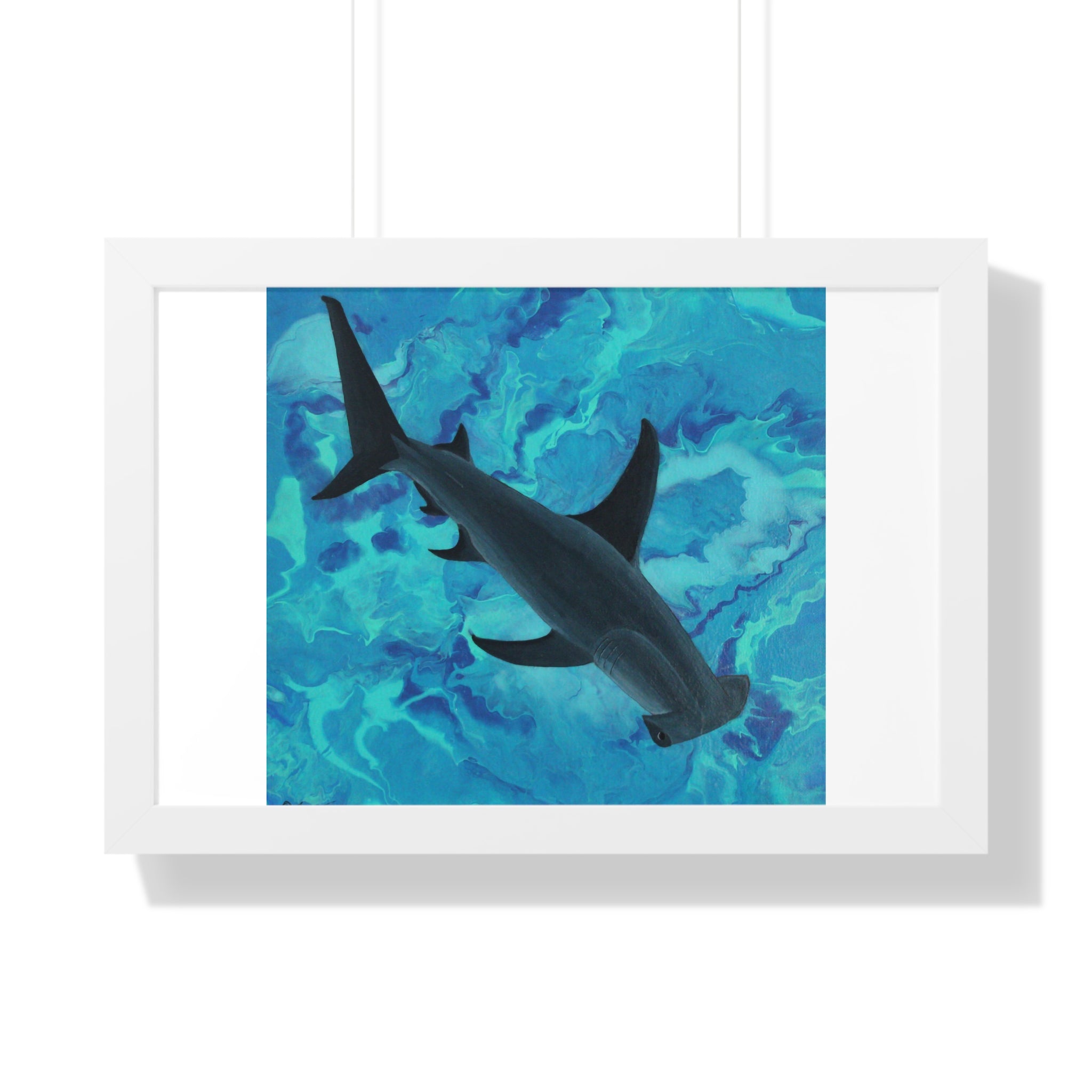 Framed artwork of a shark swimming in blue water