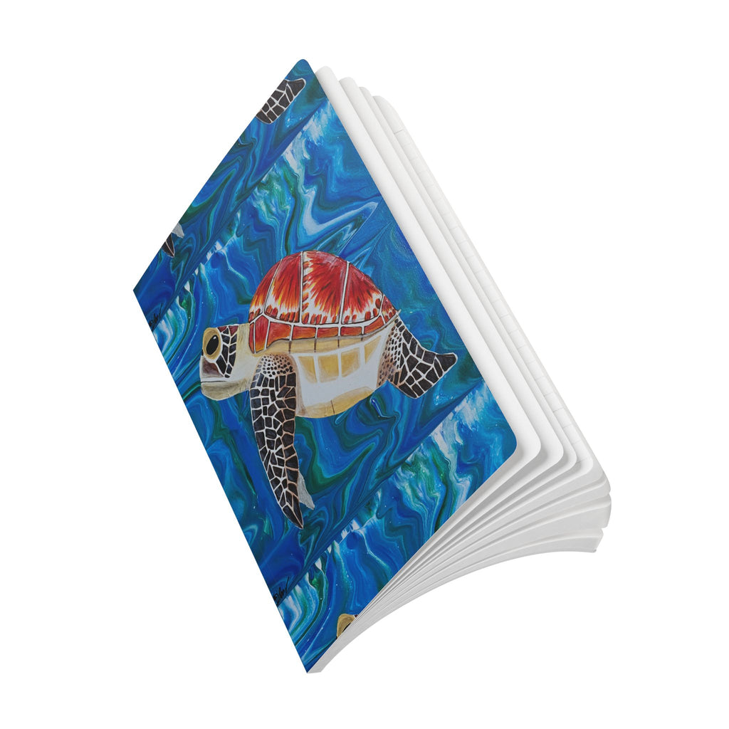 Open Notebook with a turtle design on a blue underwater background
