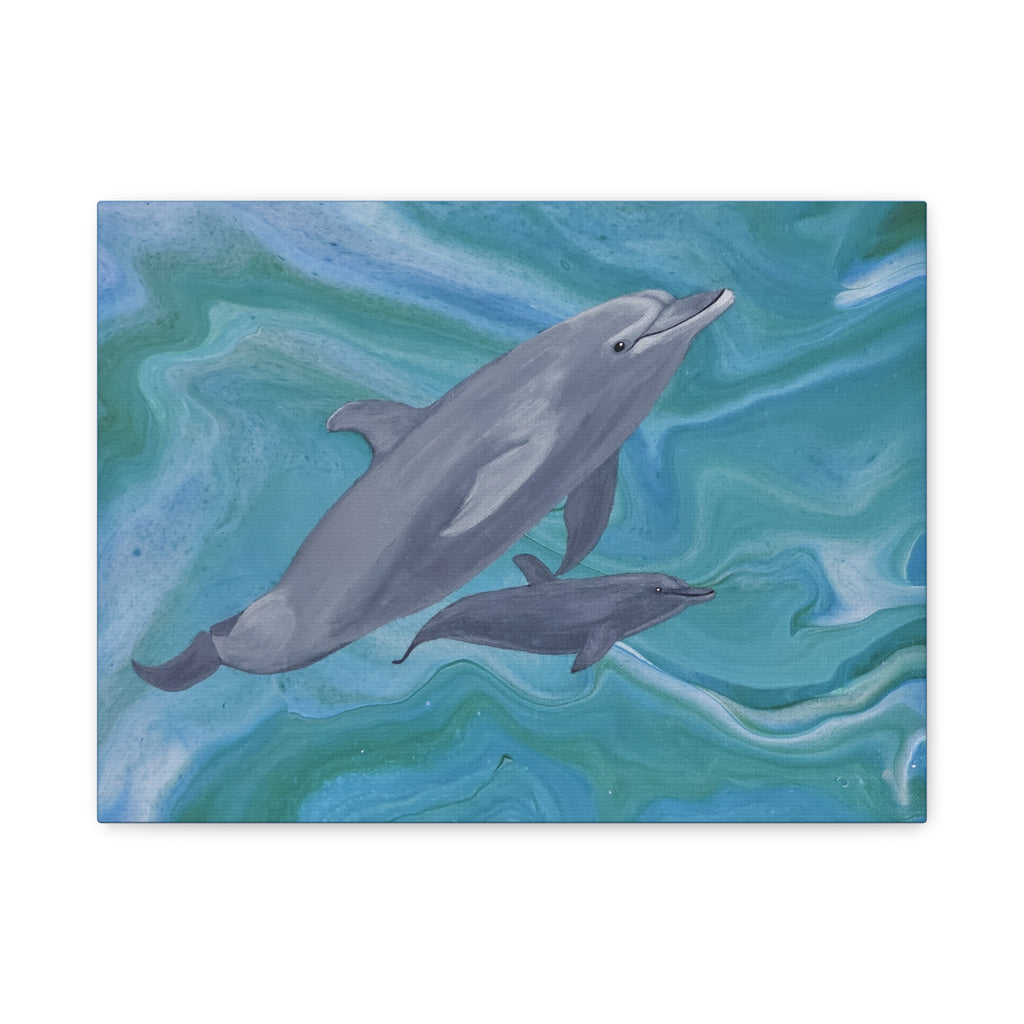 Two dolphins swimming in wavy blue and green water