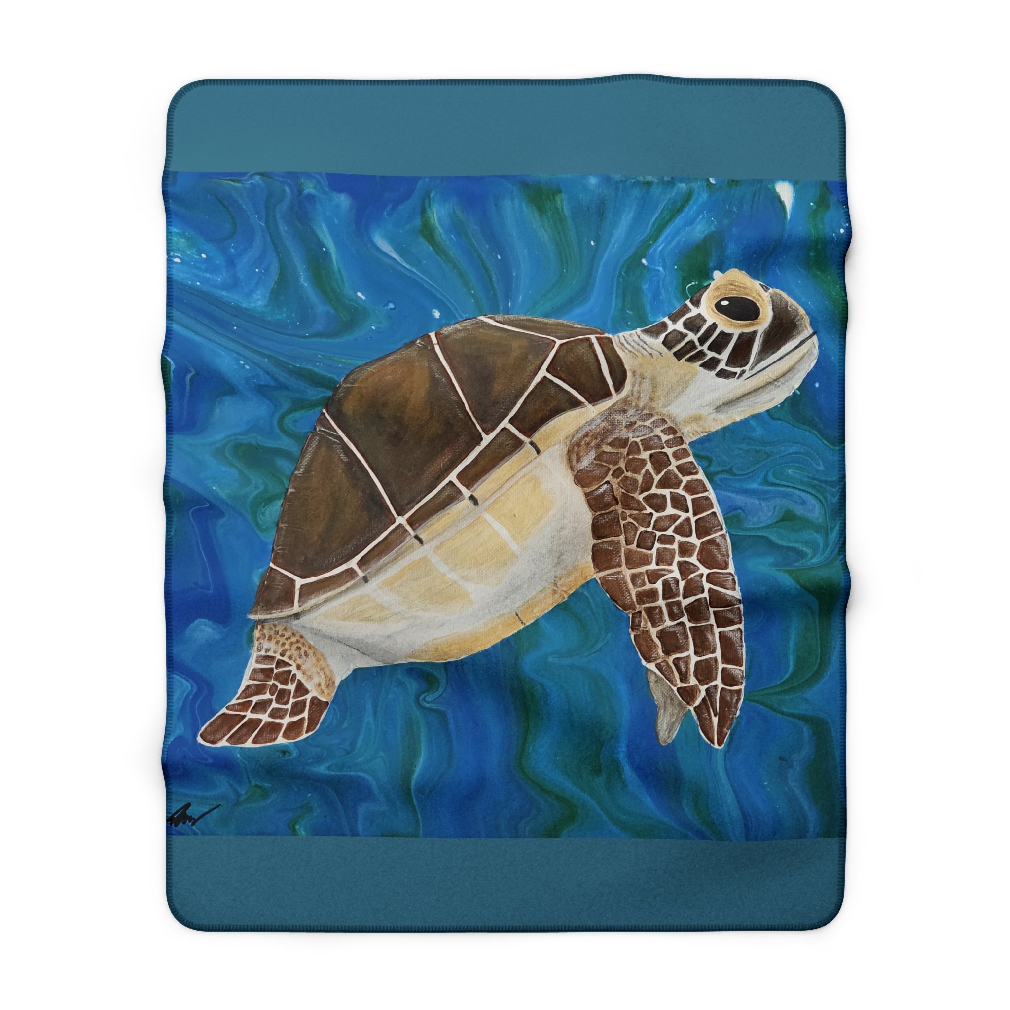 Fleece blanket with a turtle design on a blue underwater background