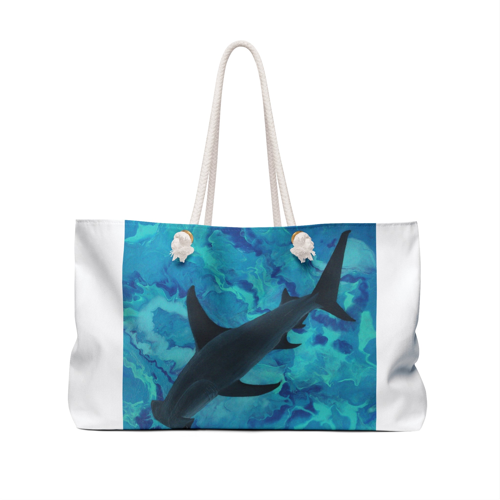 Tote bag with a shark design on a blue and white background