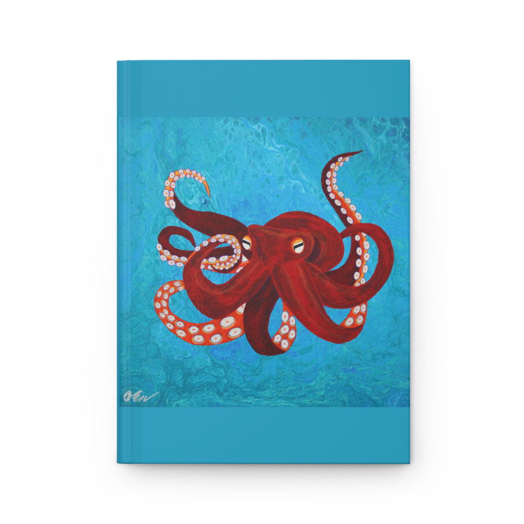 Notebook with a red octopus design on a blue textured background