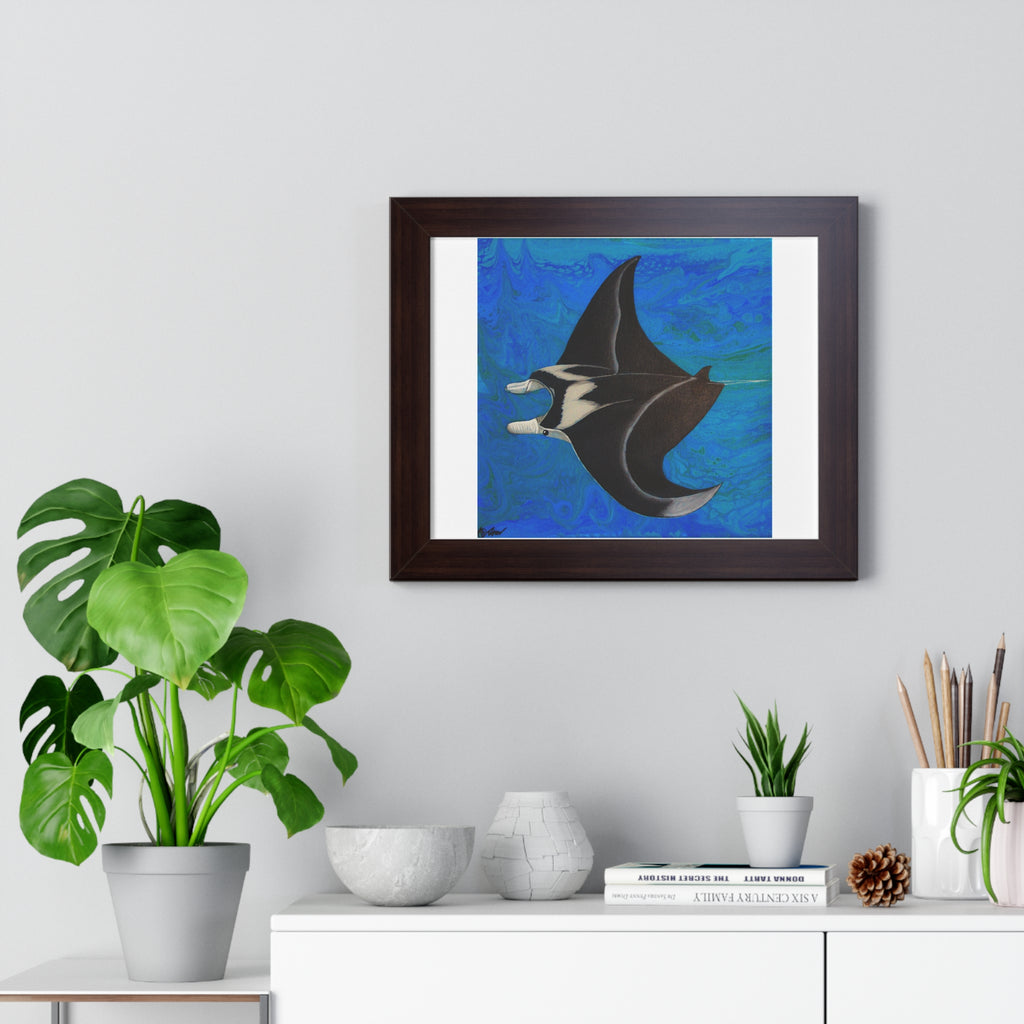 Framed artwork of a manta ray on a wall above a white cabinet with decorative items.