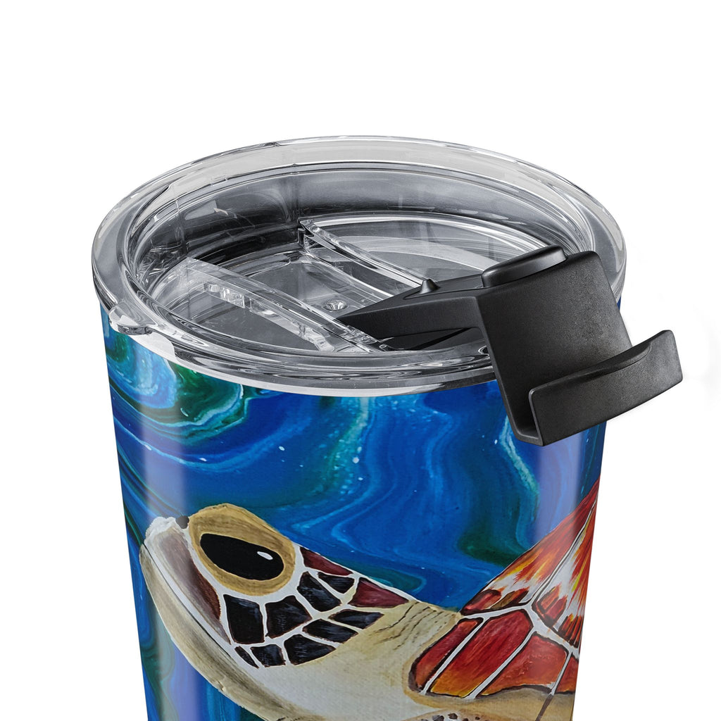 Tumbler with a turtle design on a blue background