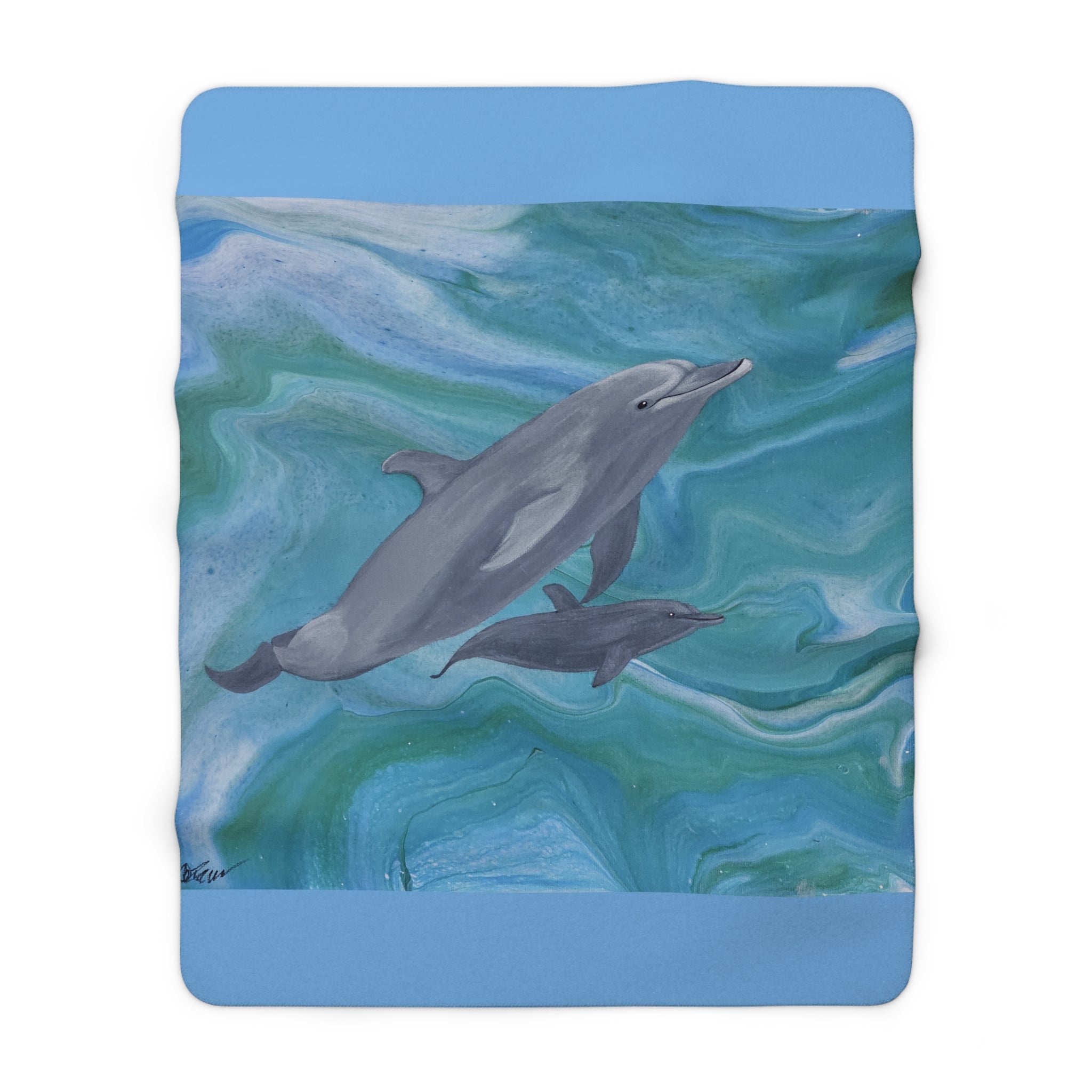 Dolphins swimming in wavy water design on a blanket