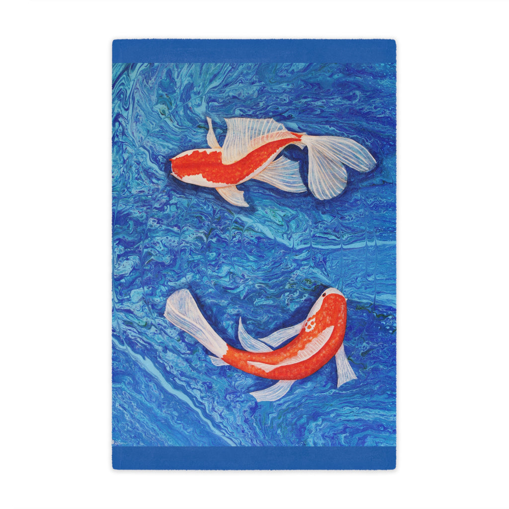 Blanket with two koi fish on a blue water background