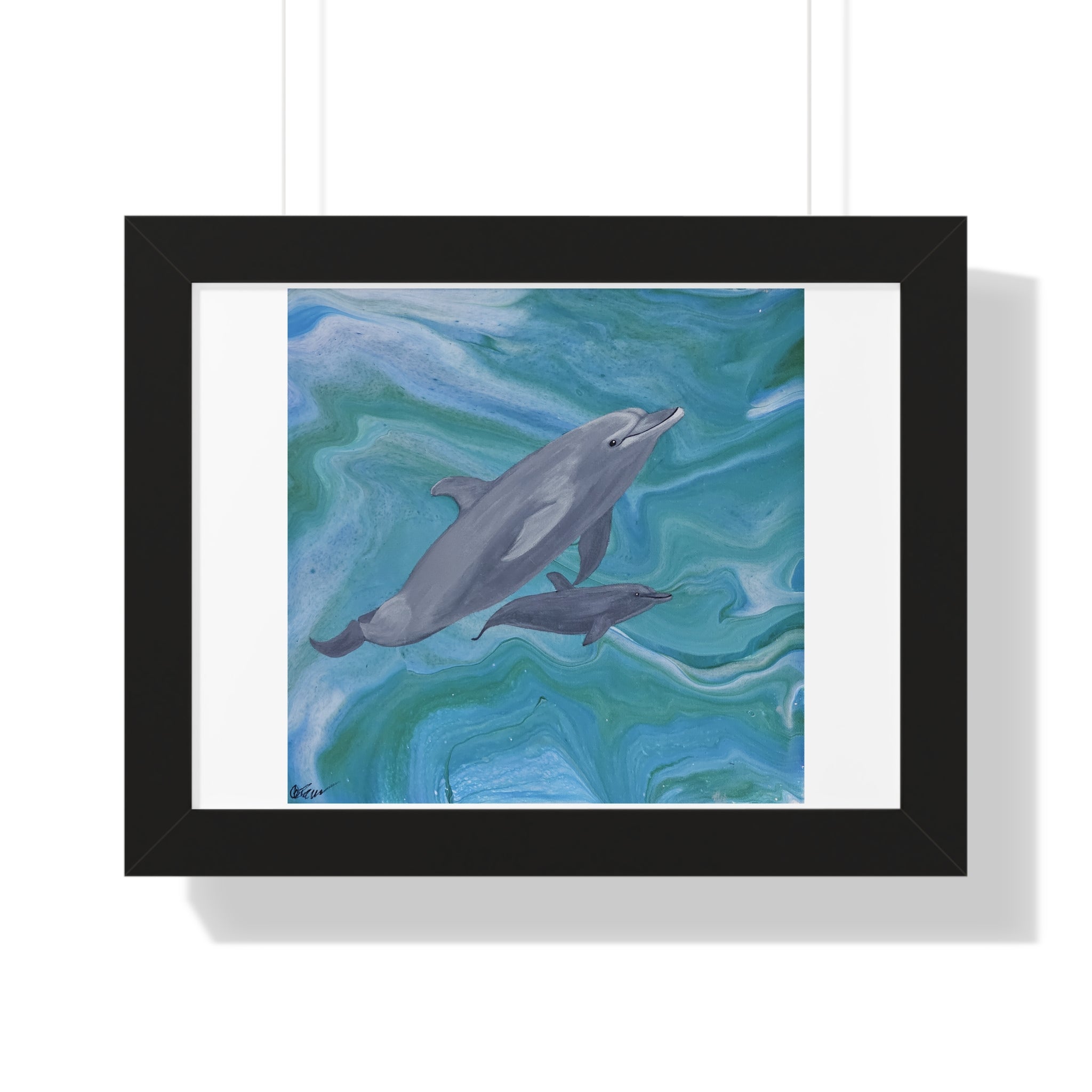 Framed artwork of two dolphins swimming in water with a black frame.