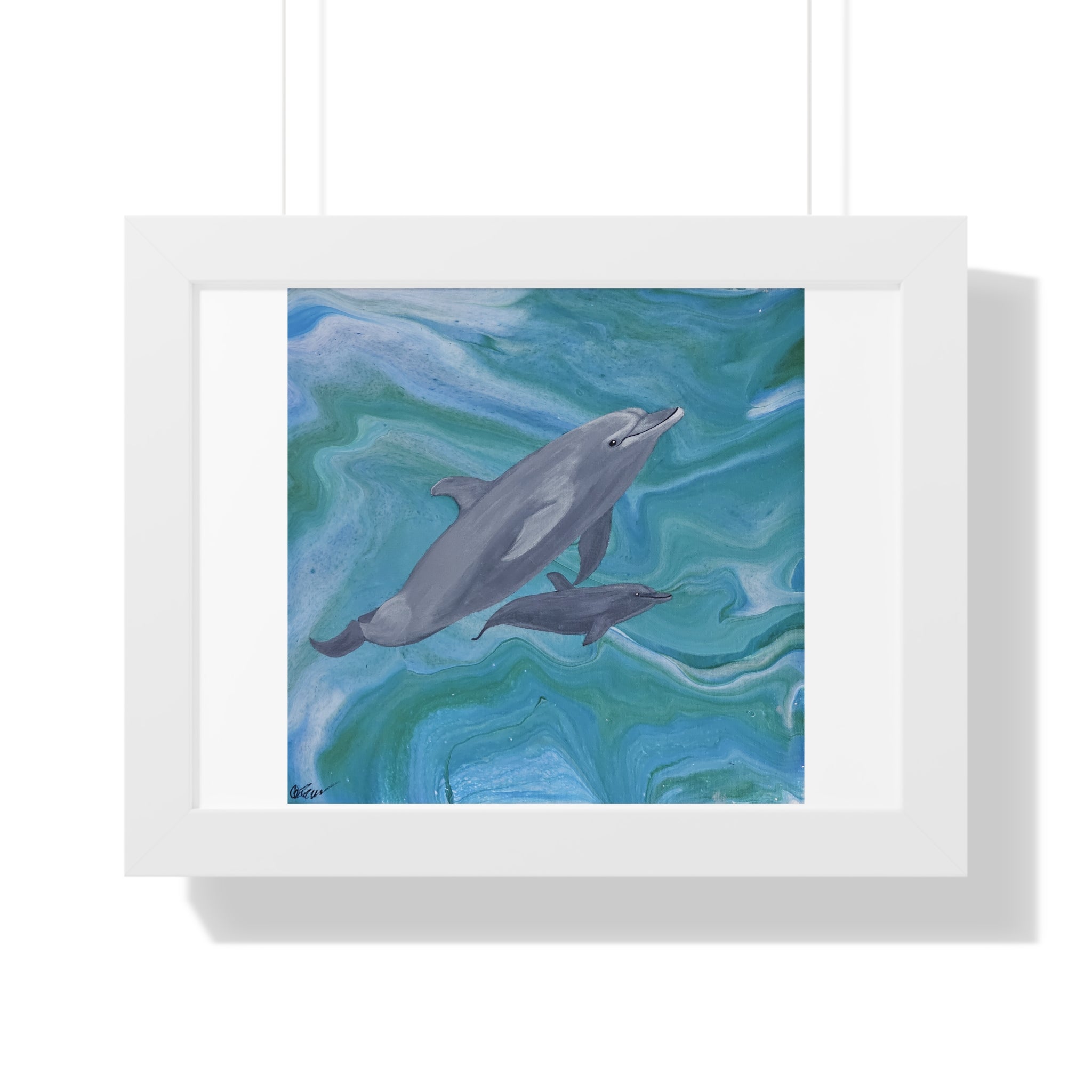 Framed artwork of two dolphins swimming in wavy blue water.