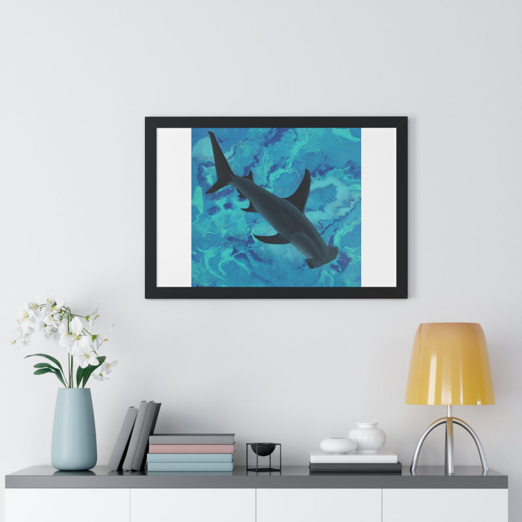 Framed artwork of a shark on a blue abstract background in a modern interior setting.