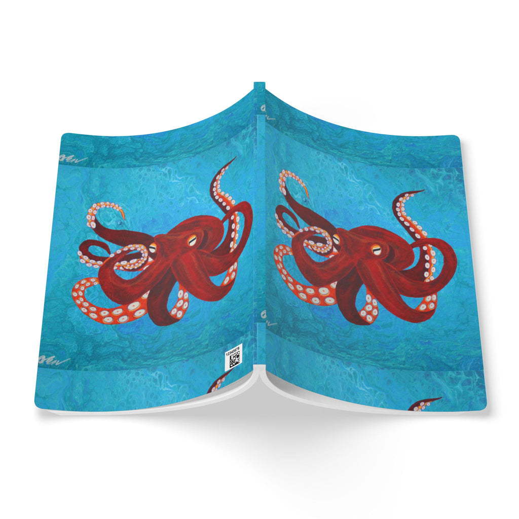 Open Notebook with red octopus design on a blue background