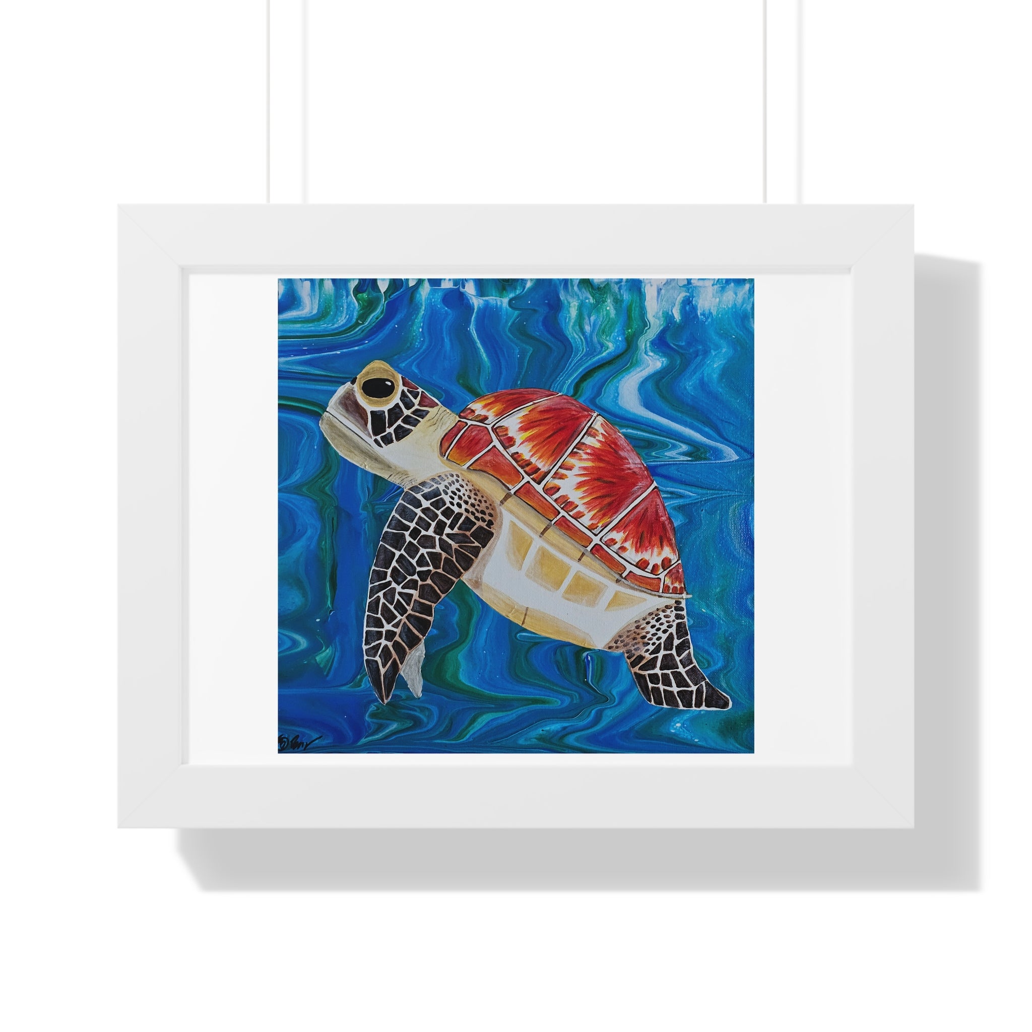 Framed artwork of a turtle with a colorful design on a blue background