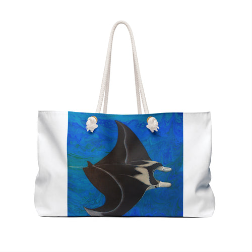 Tote bag with a manta ray design on a blue and white background