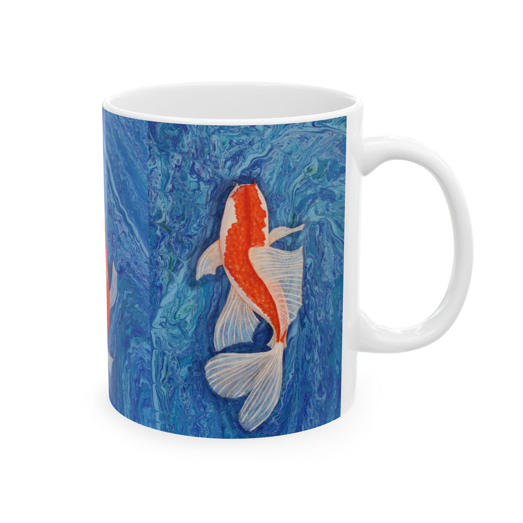 Mug with a goldfish design on a blue marbled background