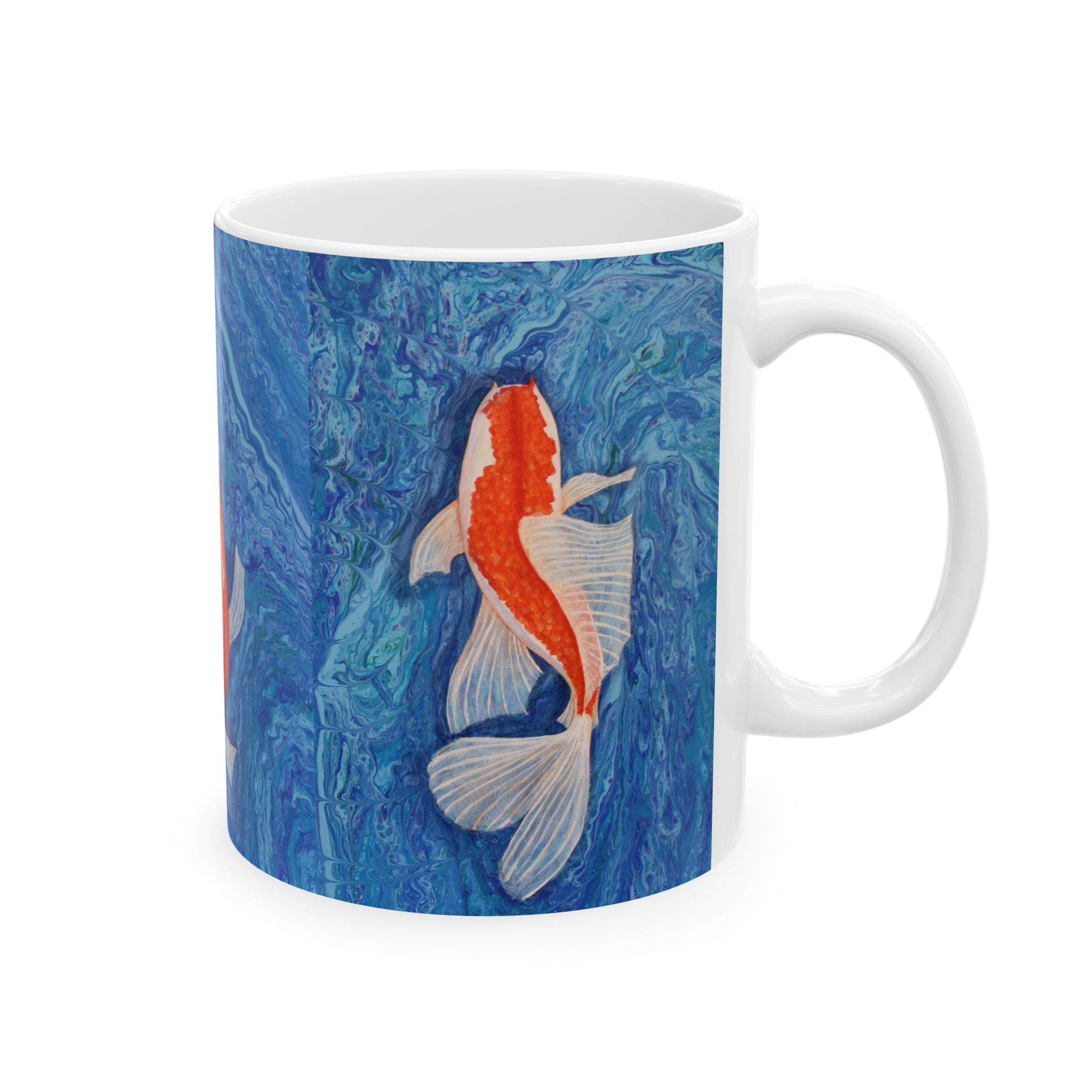 Mug with a goldfish design on a blue marbled background
