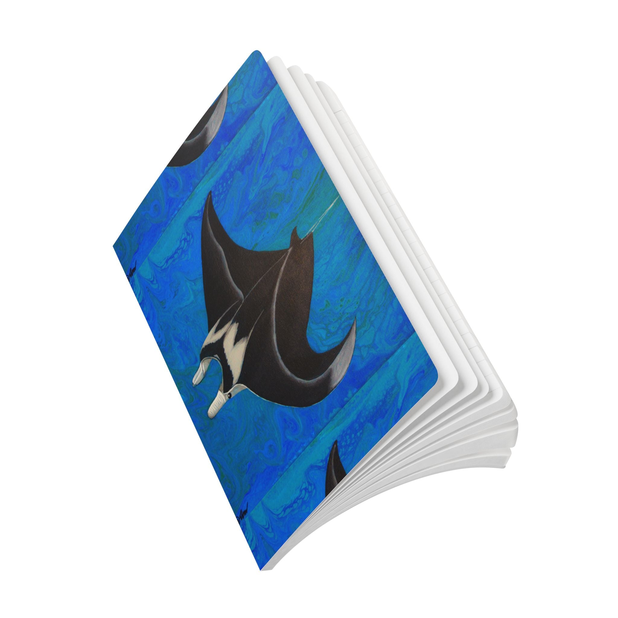 Open journal with a manta ray design on a blue background