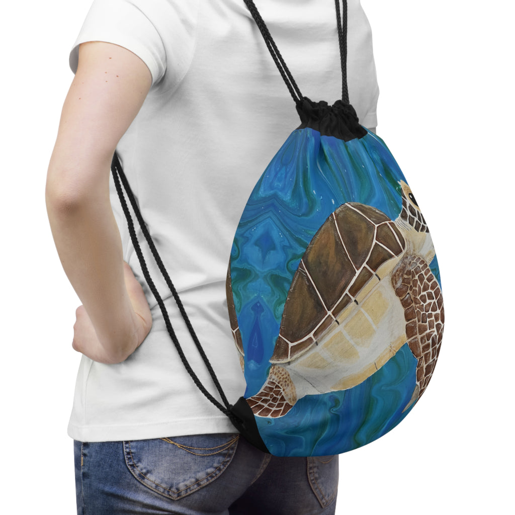Person wearing a drawstring bag with a turtle design on a white background