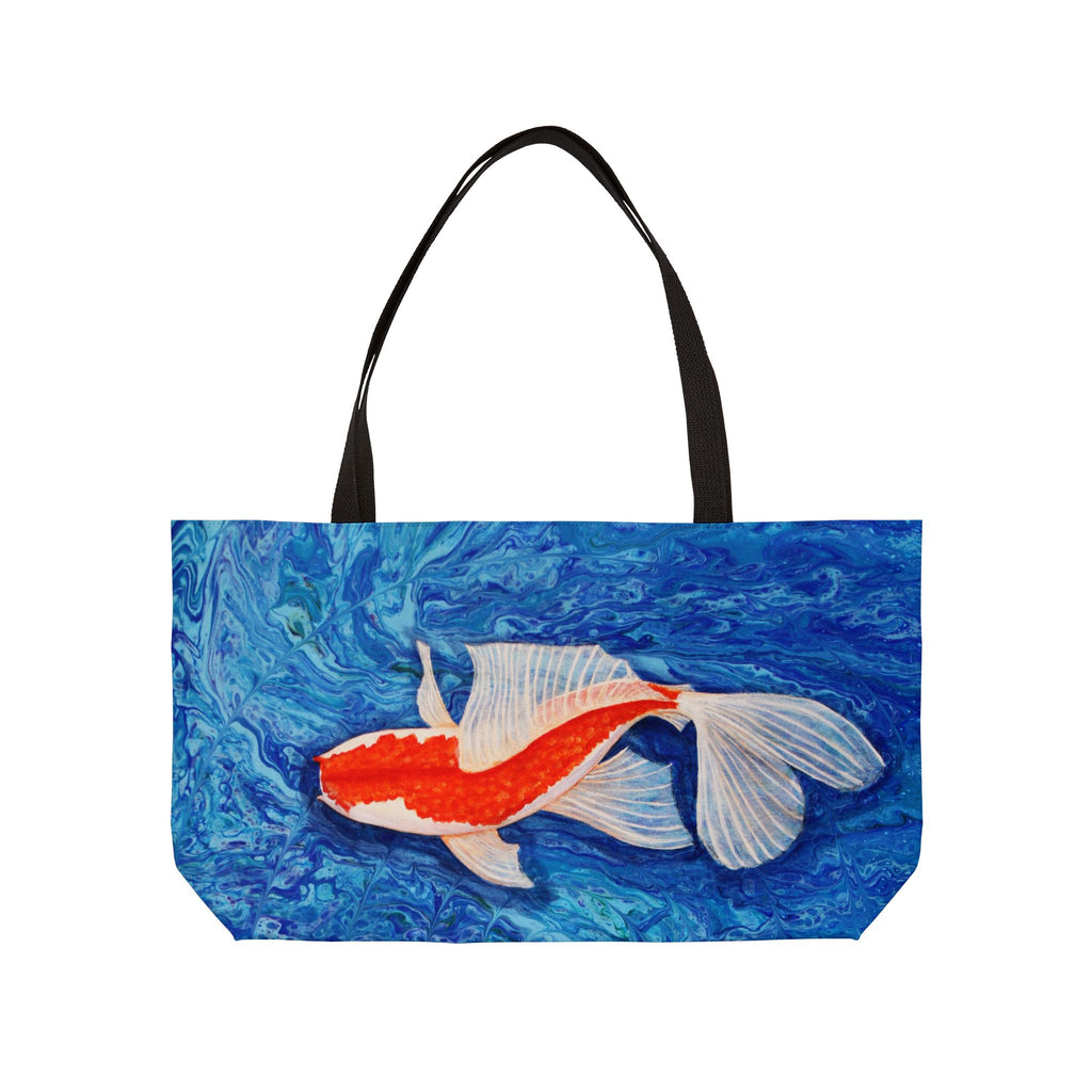 Tote bag with a goldfish design on a blue watercolor background