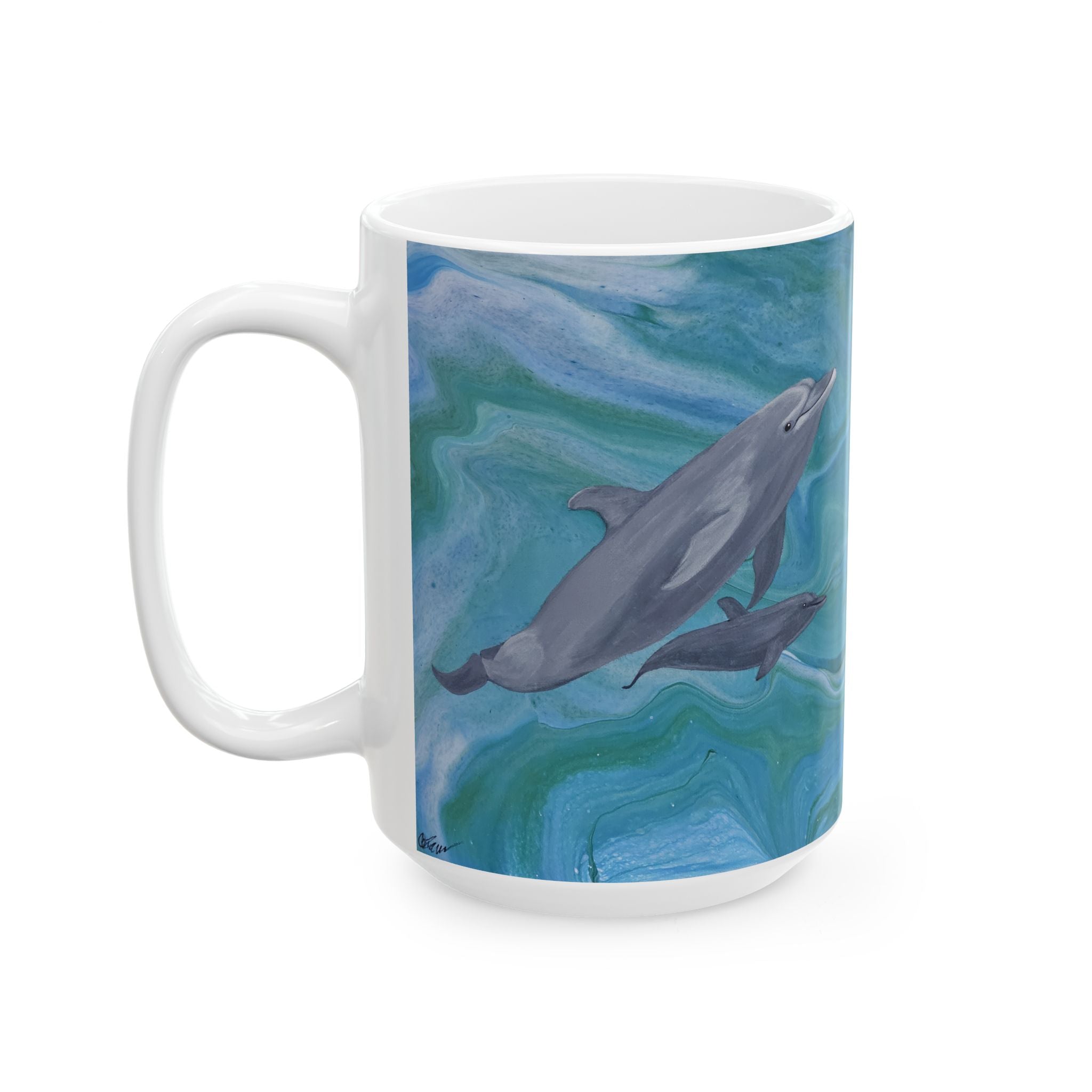 White mug with dolphin design on a white background