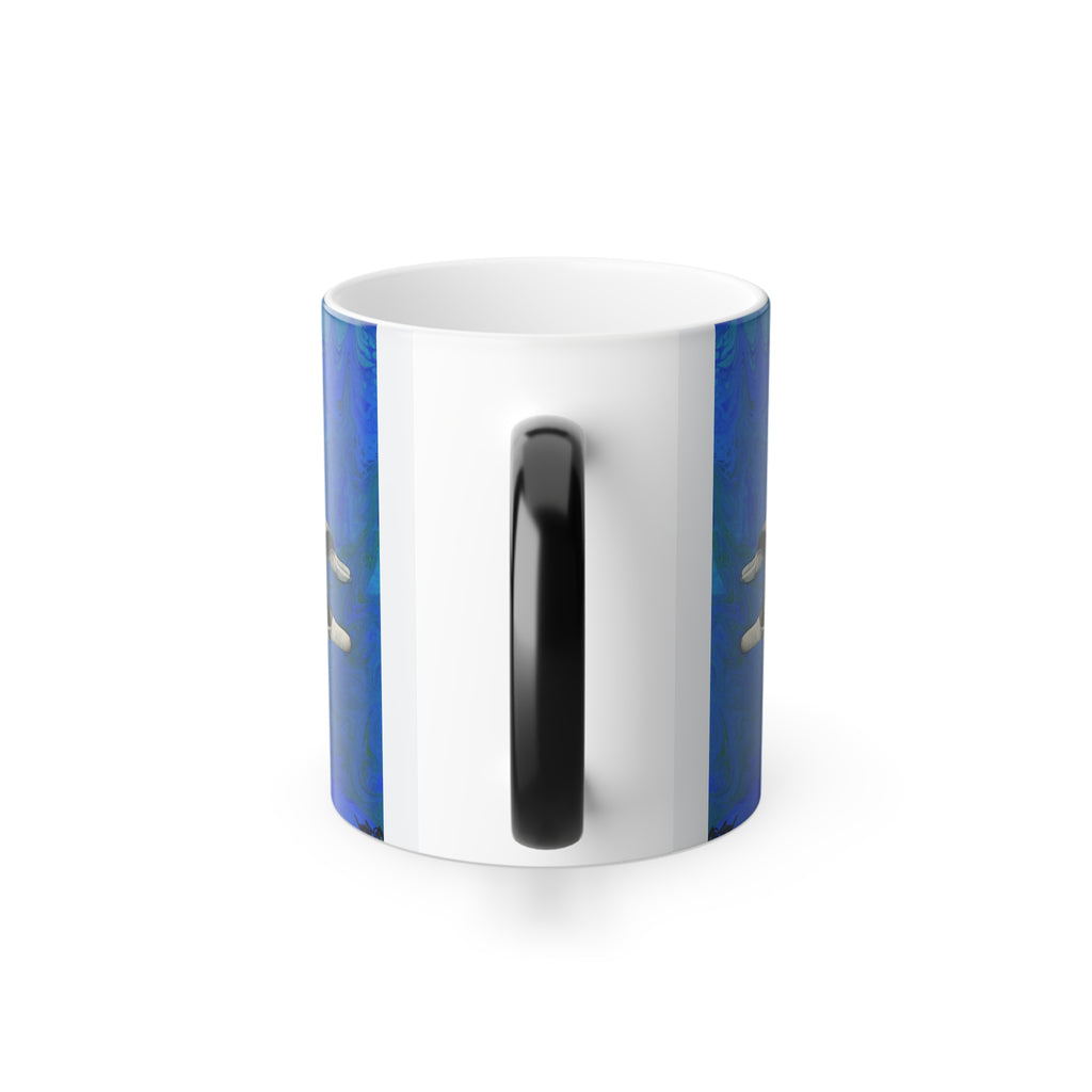 White mug with blue interior and handle on a white background