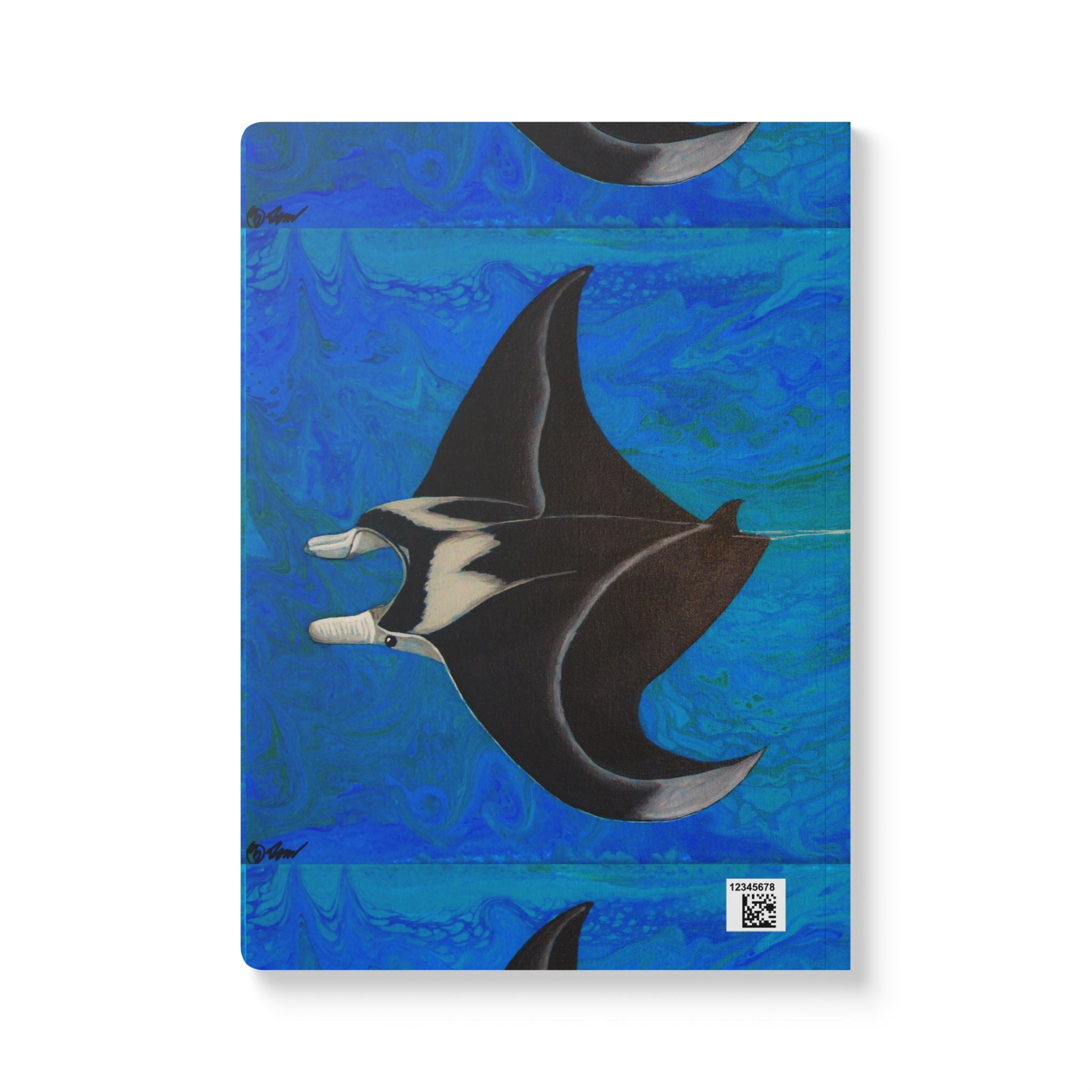 Notebook with manta ray design on a blue abstract background