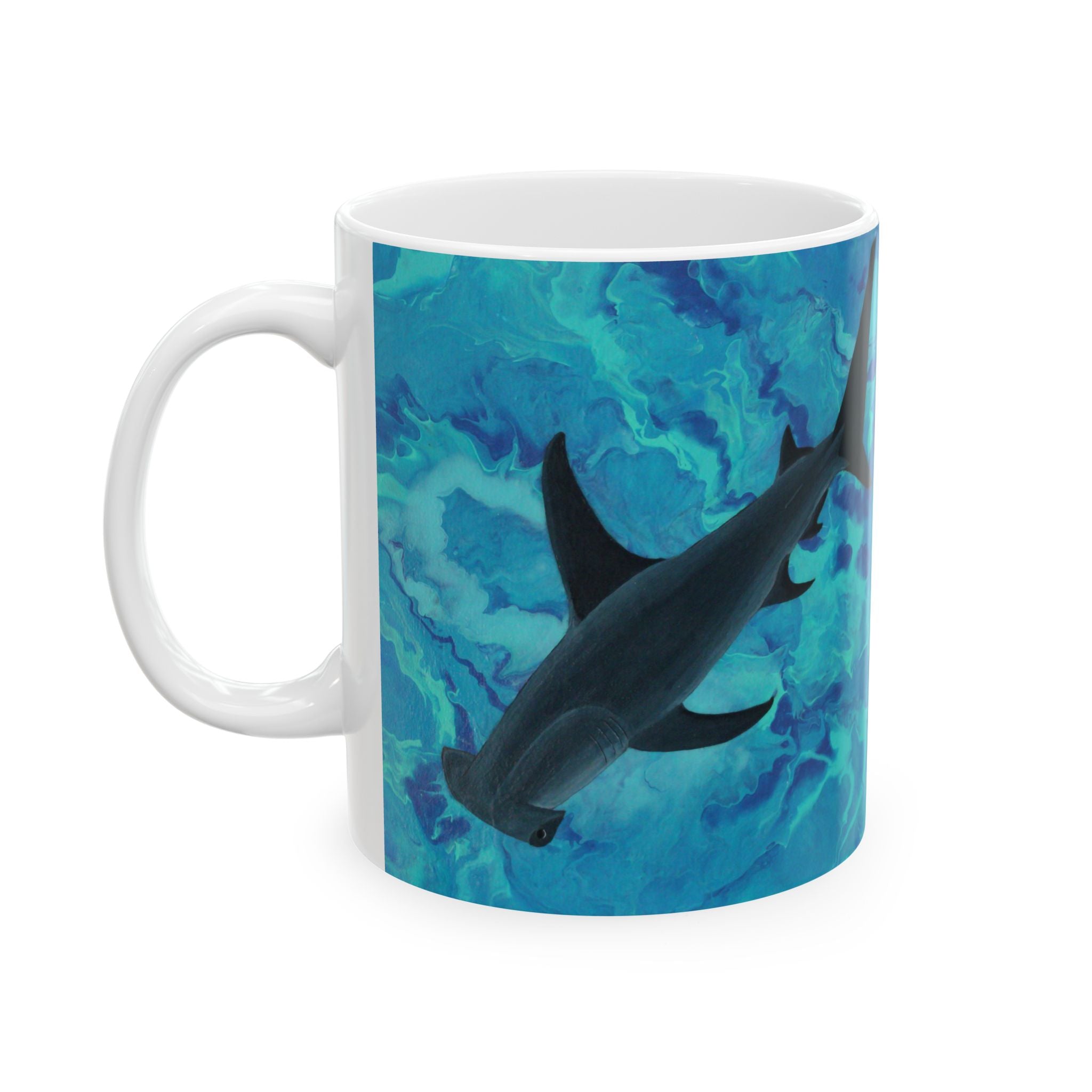 Mug with Shark design on a blue and green abstract pattern