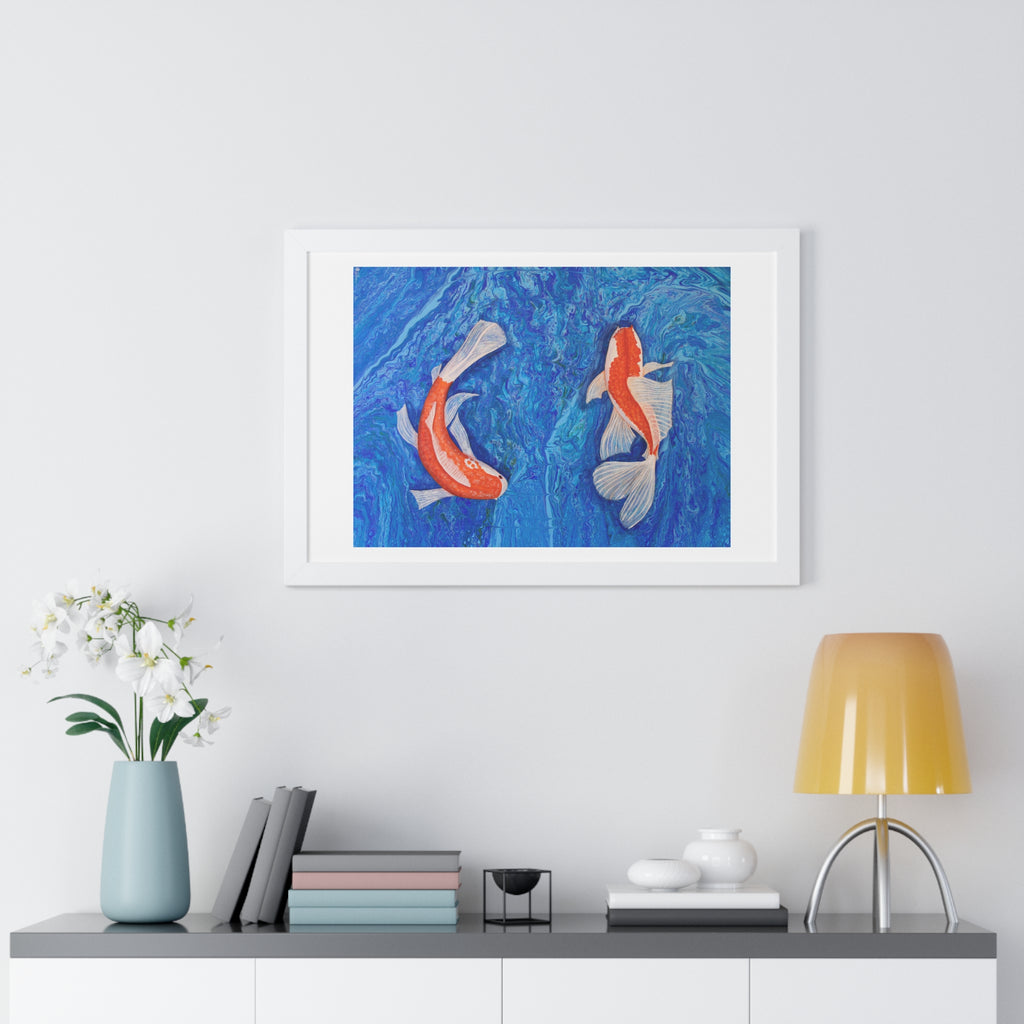 Framed artwork of two koi fish on a blue background, displayed on a wall above a shelf with decor items.