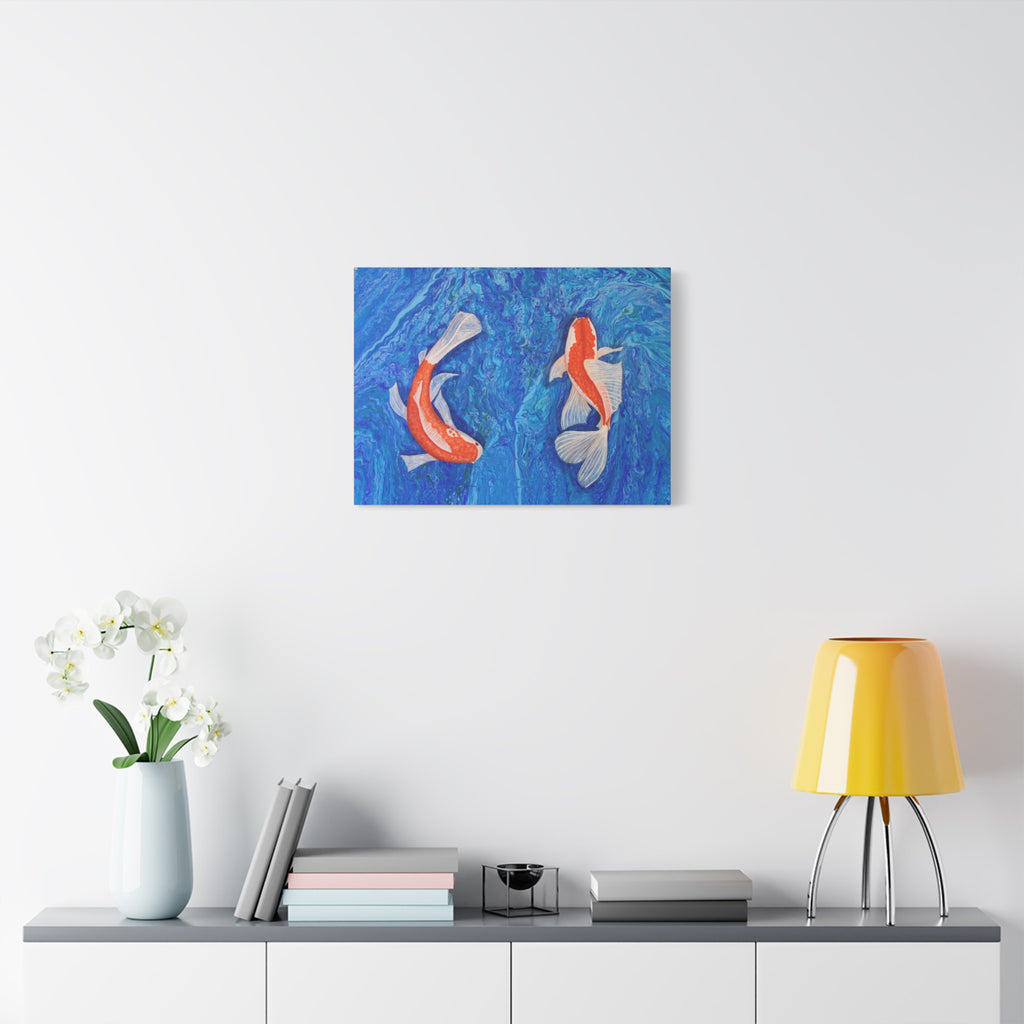 Abstract painting of two fish on a blue background above a shelf with decor items.