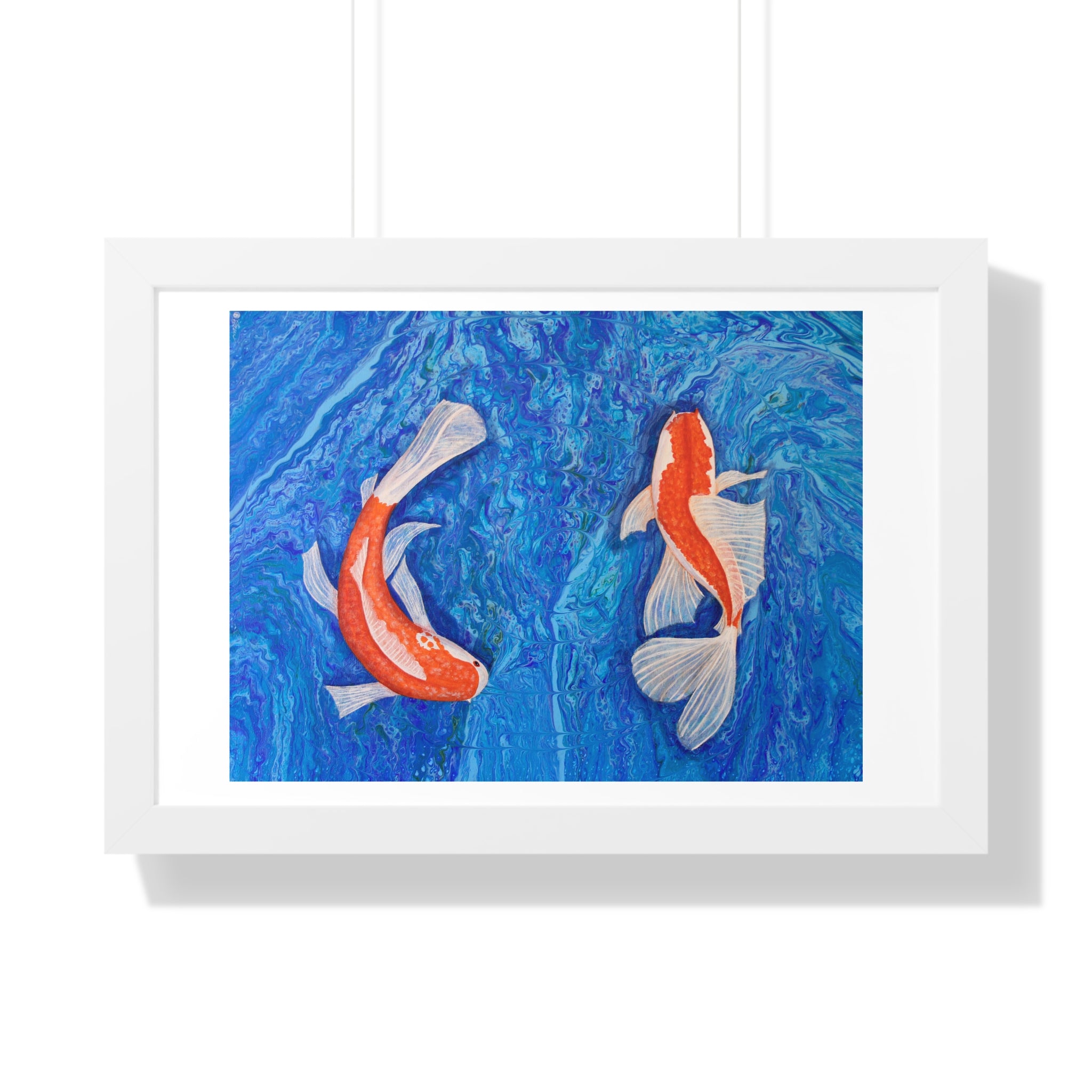 Framed artwork of two koi fish on a blue background